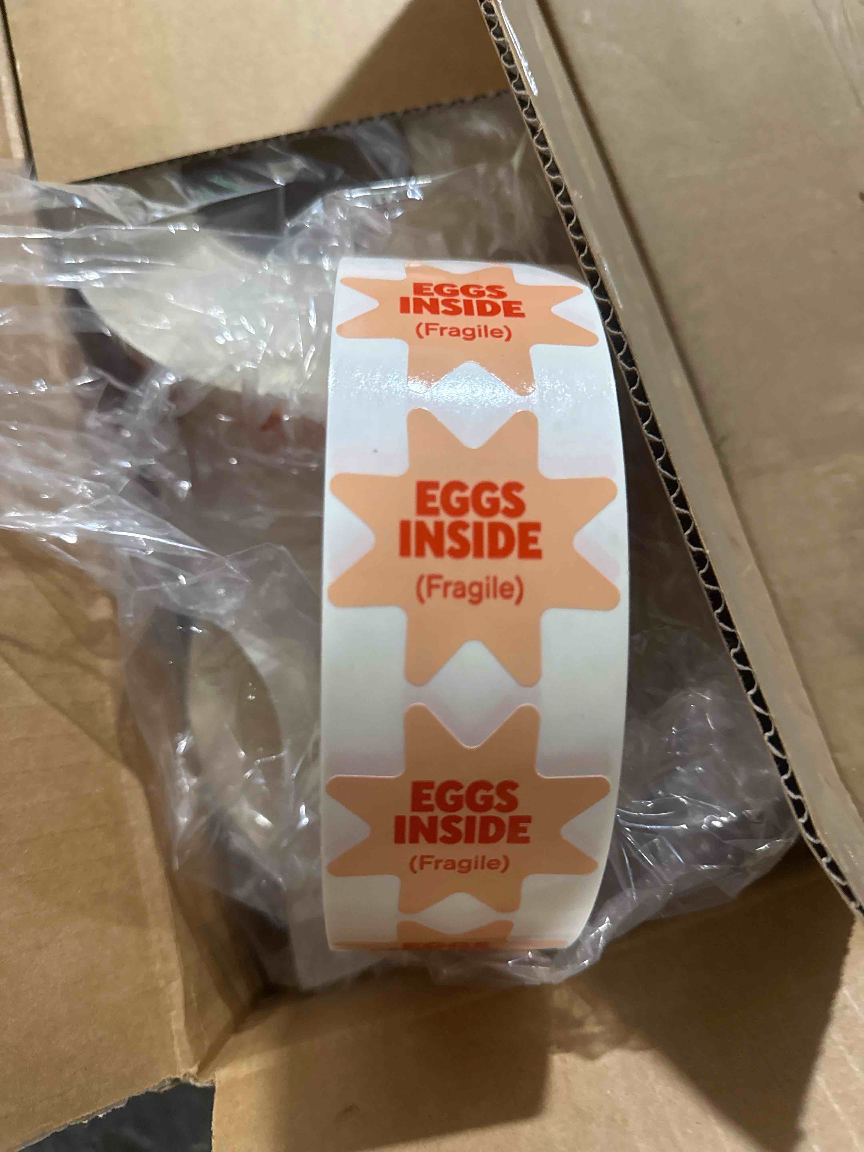 Condition photo showing New/Like New for case of eggs inside (fragile) shipping labels