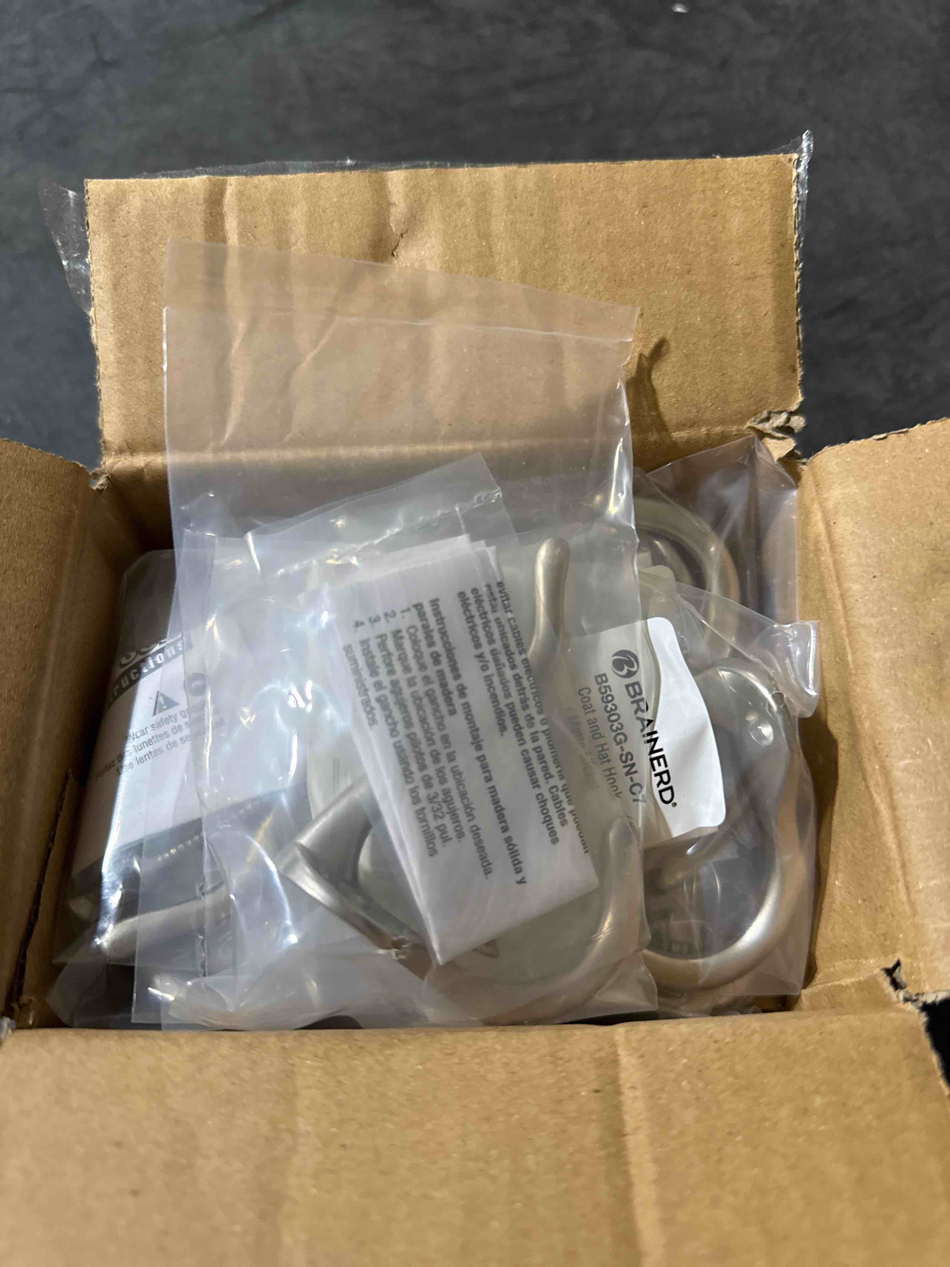 Condition photo showing New/Like New for pack of 10 brainerd coat and hat hook, available in multiple colors