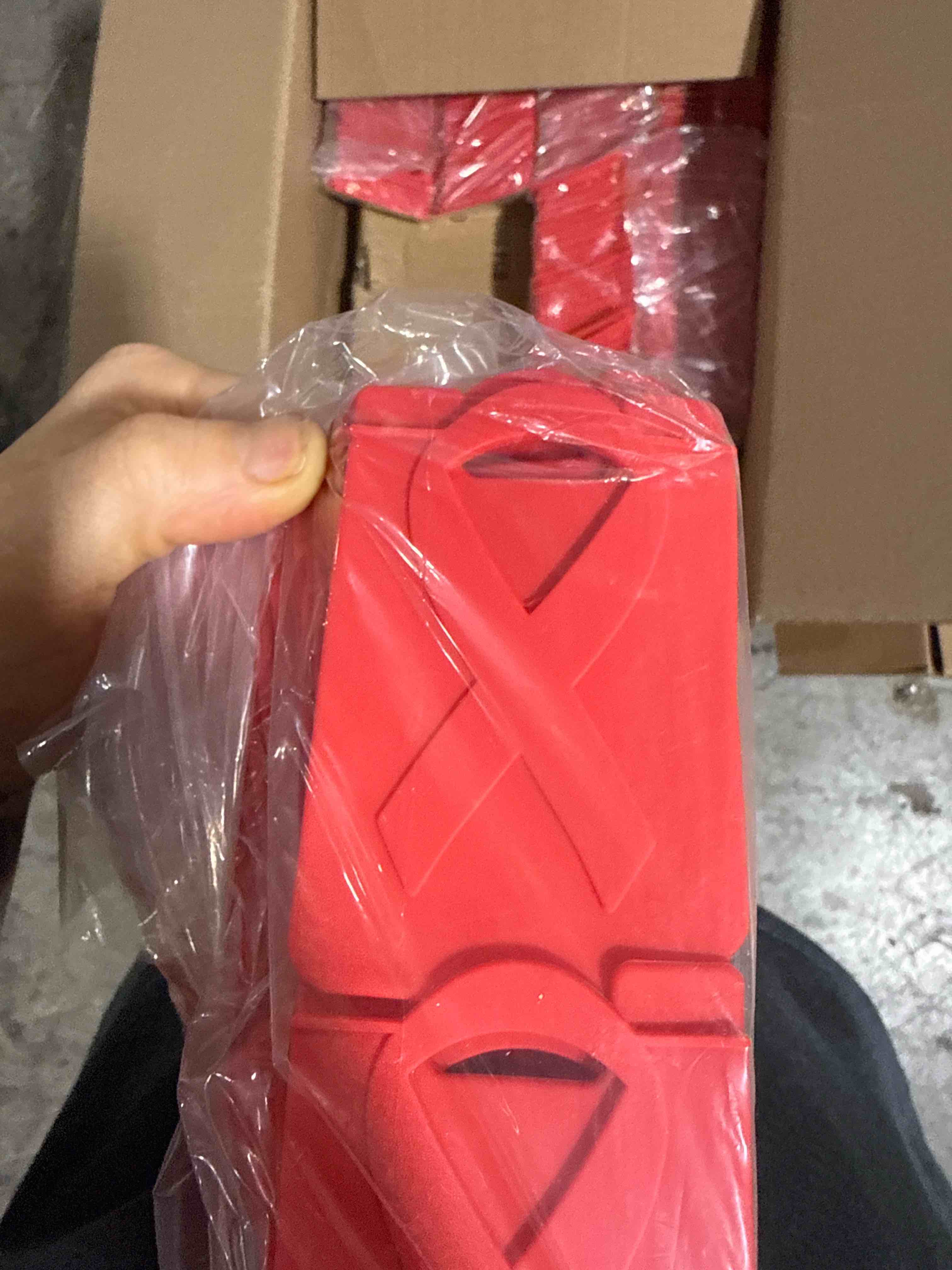 Condition photo showing Brand New for (case of 100) silicone phone wallet featuring an embossed awareness ribbon that securely sticks to the back of your phone to conveniently hold one credit card or id.