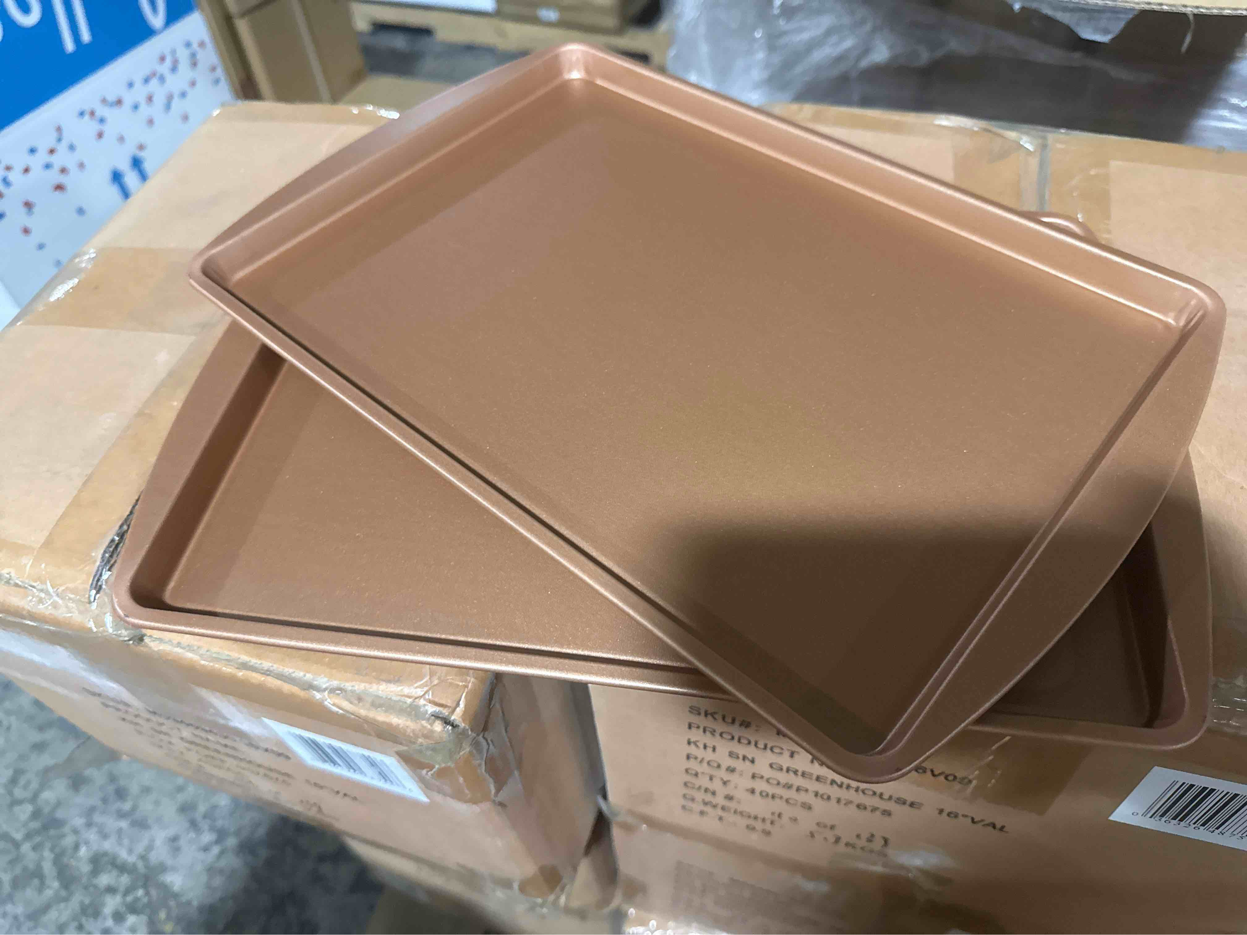 Condition photo showing New/Like New for set of 4 copper cookie sheets 9” x 13”