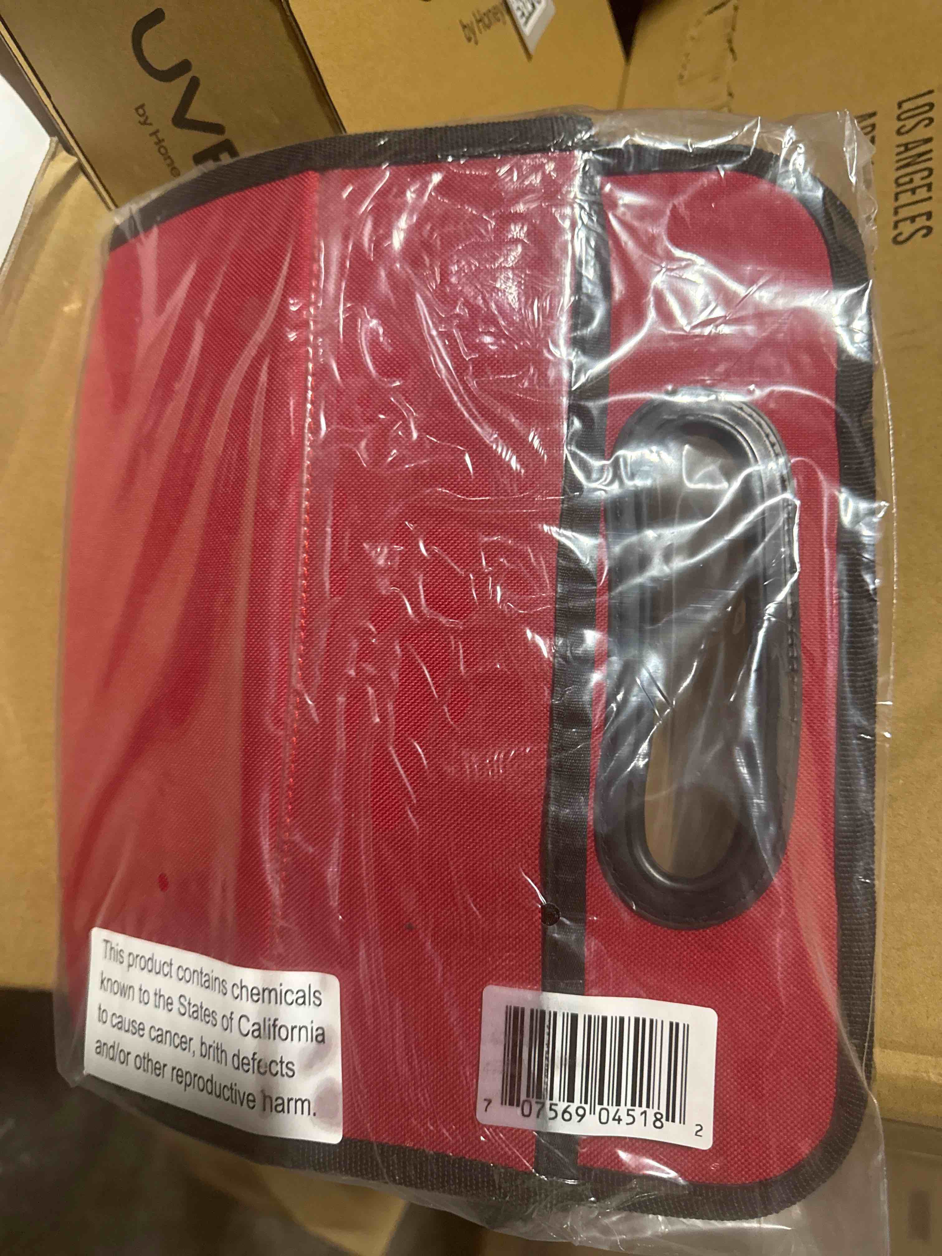 Condition photo showing New/Like New for red foldable car seat organizer with cup holders