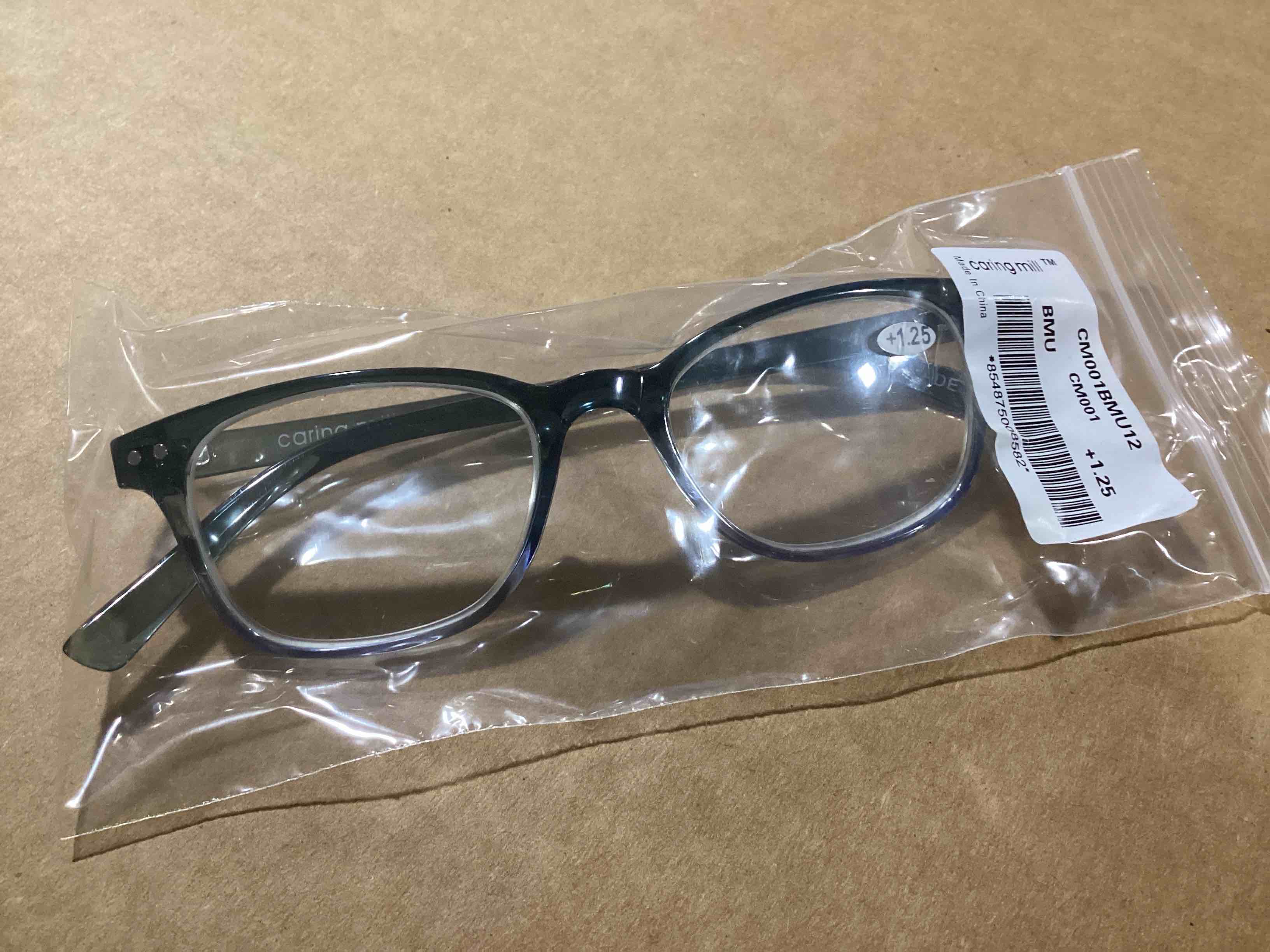 Condition photo showing New/Like New for case of 12 caring mill reading glasses +1.25
