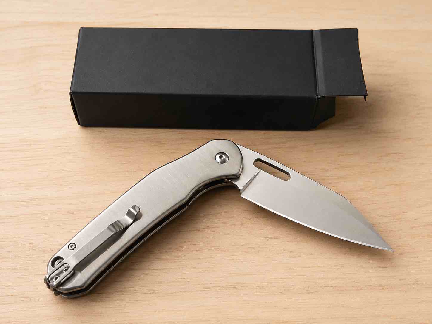 heavy-duty stainless steel folding pocket knife featuring a sharp precision blade, durable all-metal construction, and a sleek modern design for everyday carry, outdoor adventures, and utility tasks.