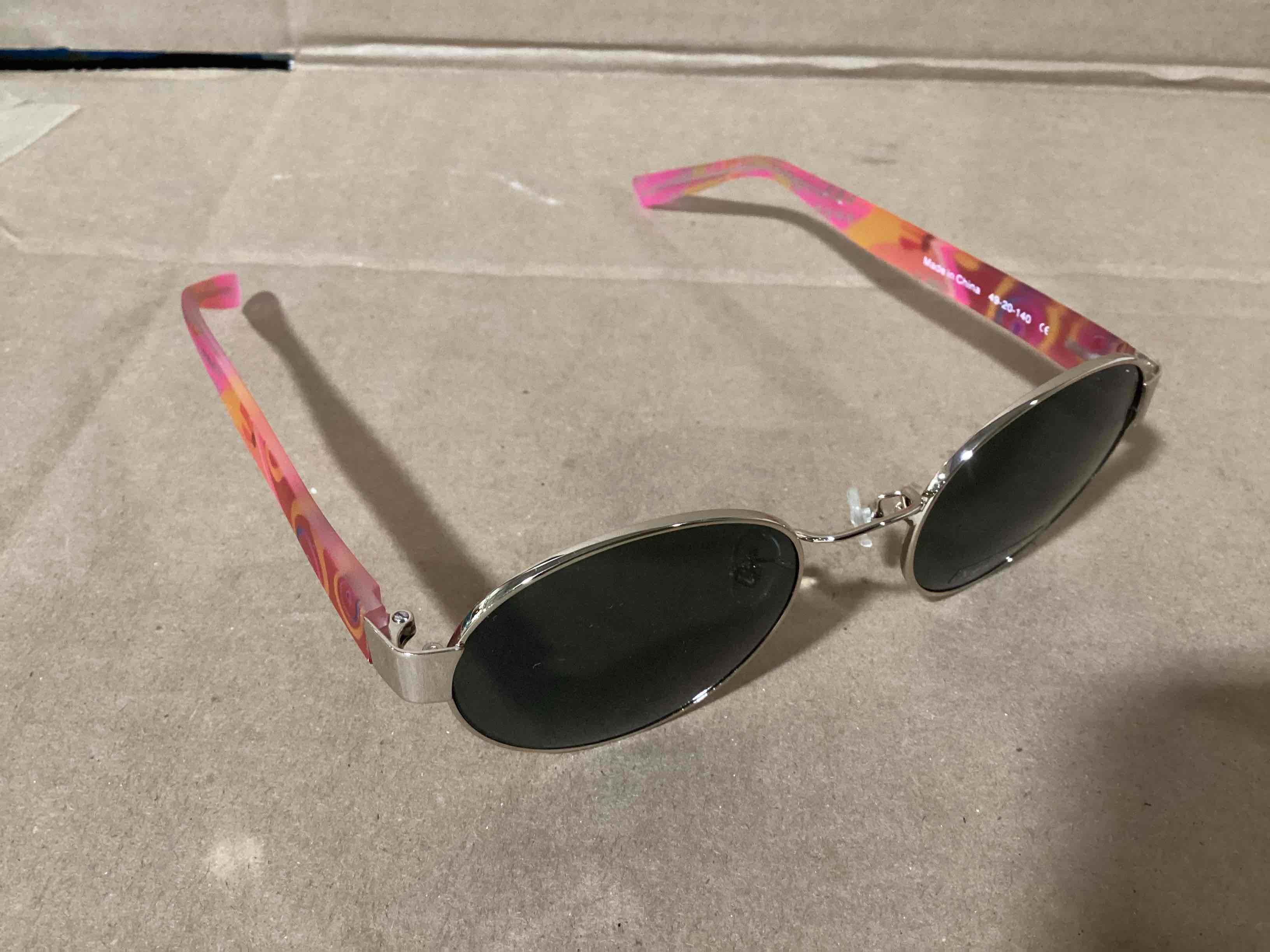 Condition photo showing New/Like New for case of 12 girls new wave sunglasses 