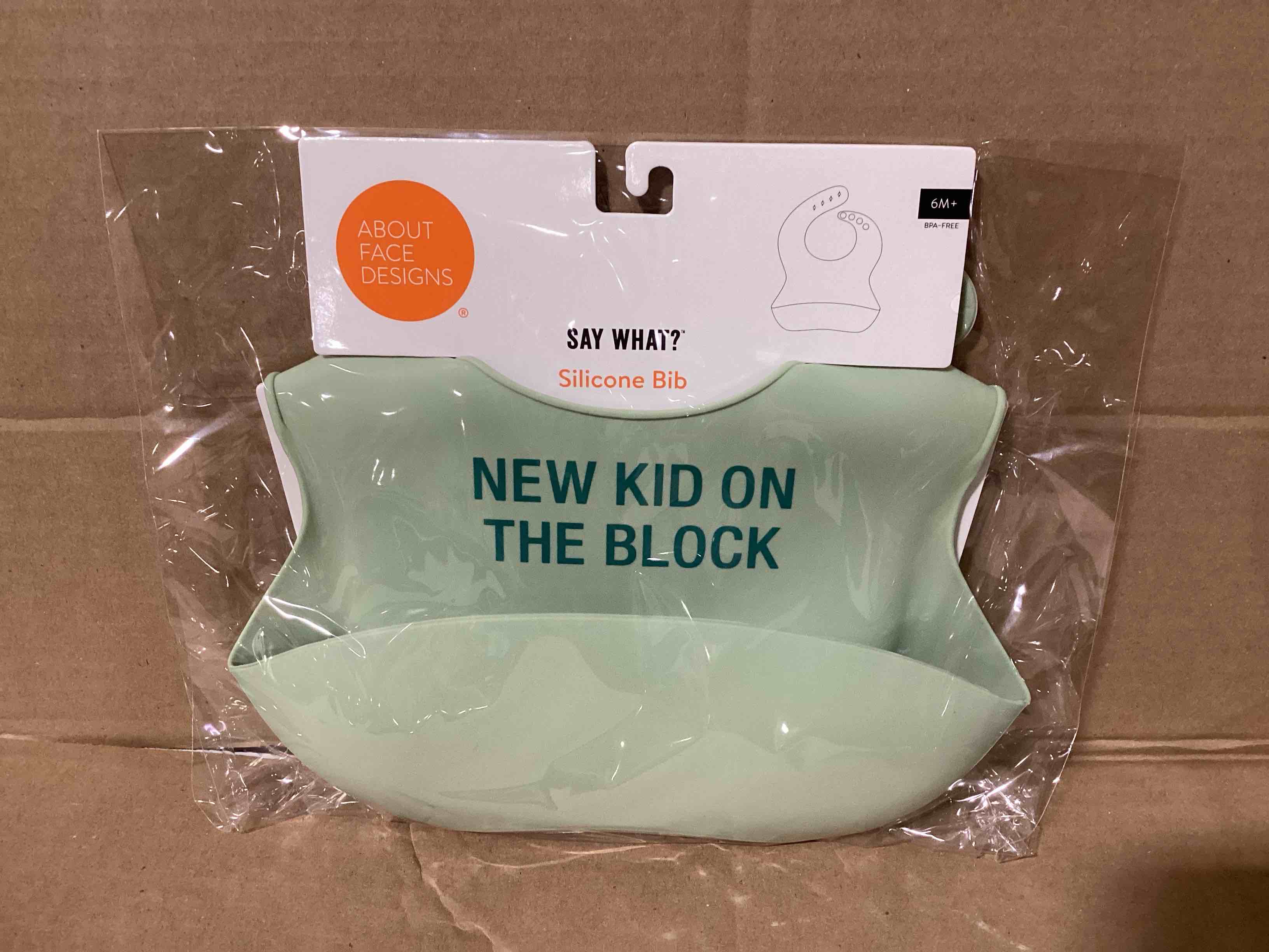 Condition photo showing New/Like New for new kid on the block silicone bib