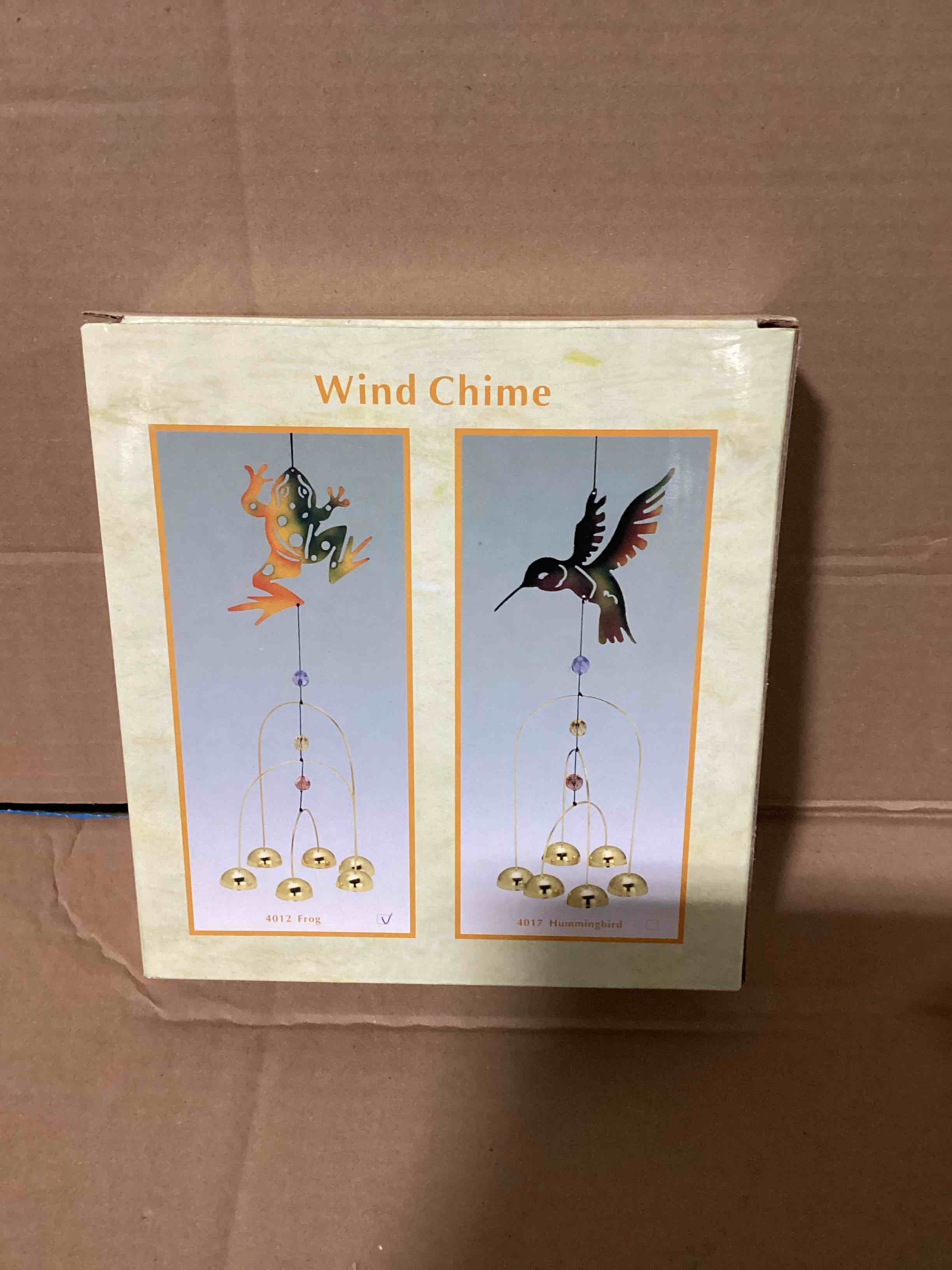 Condition photo showing New/Like New for frog wind chime