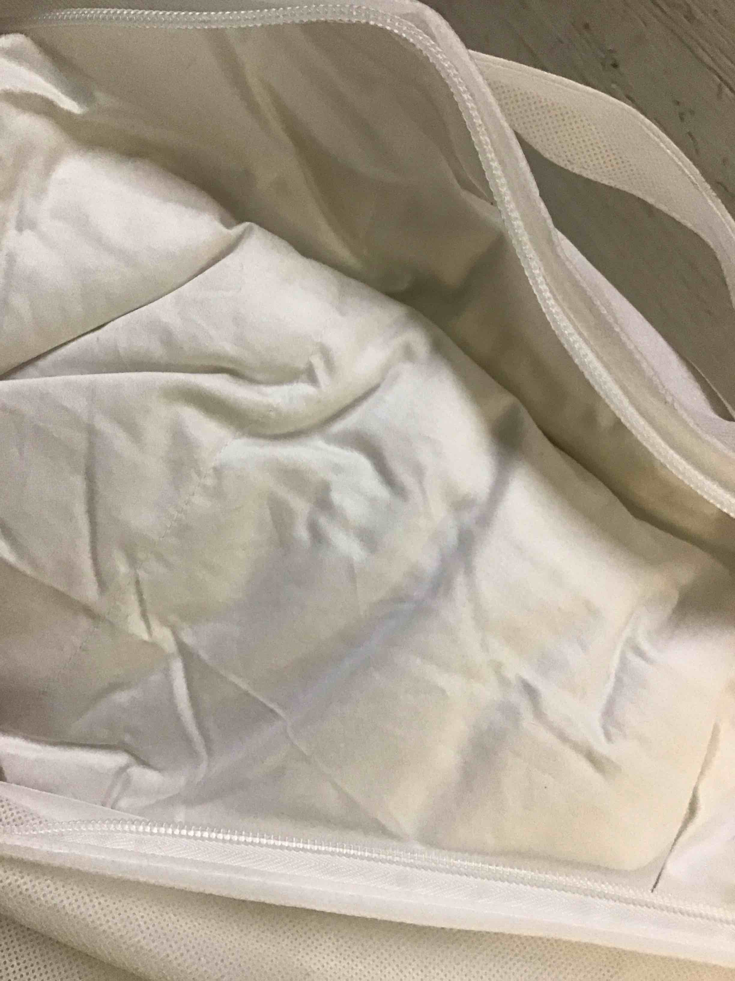 Condition photo showing As Is for quince premium down comforter full/queen 