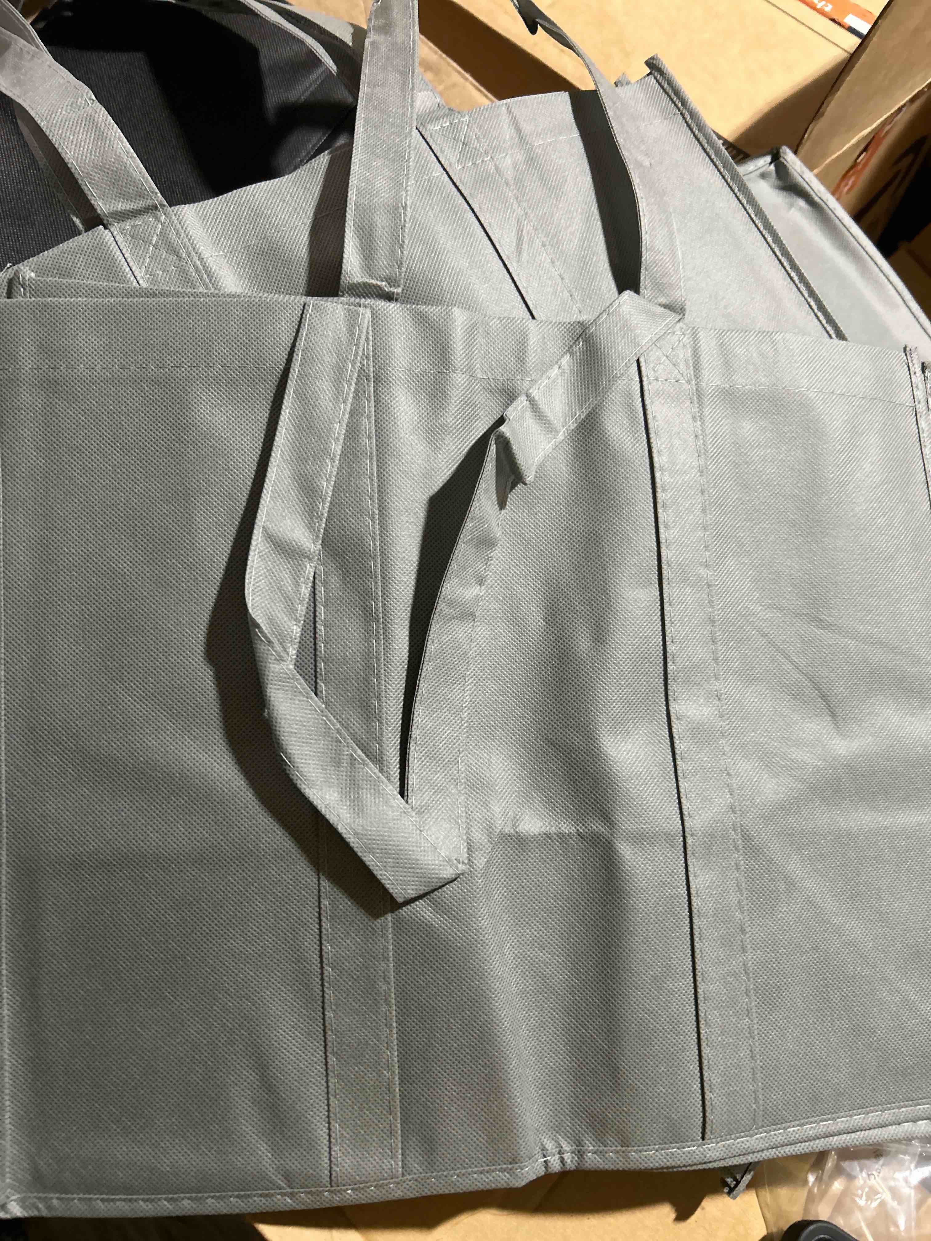 10 black bags and 10 gray fabric bags