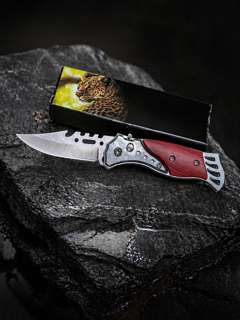 Sleek and rugged, this spring-assisted folding knife features a razor-sharp stainless steel blade and a stylish wood-accented handle built for both performance and everyday carry.