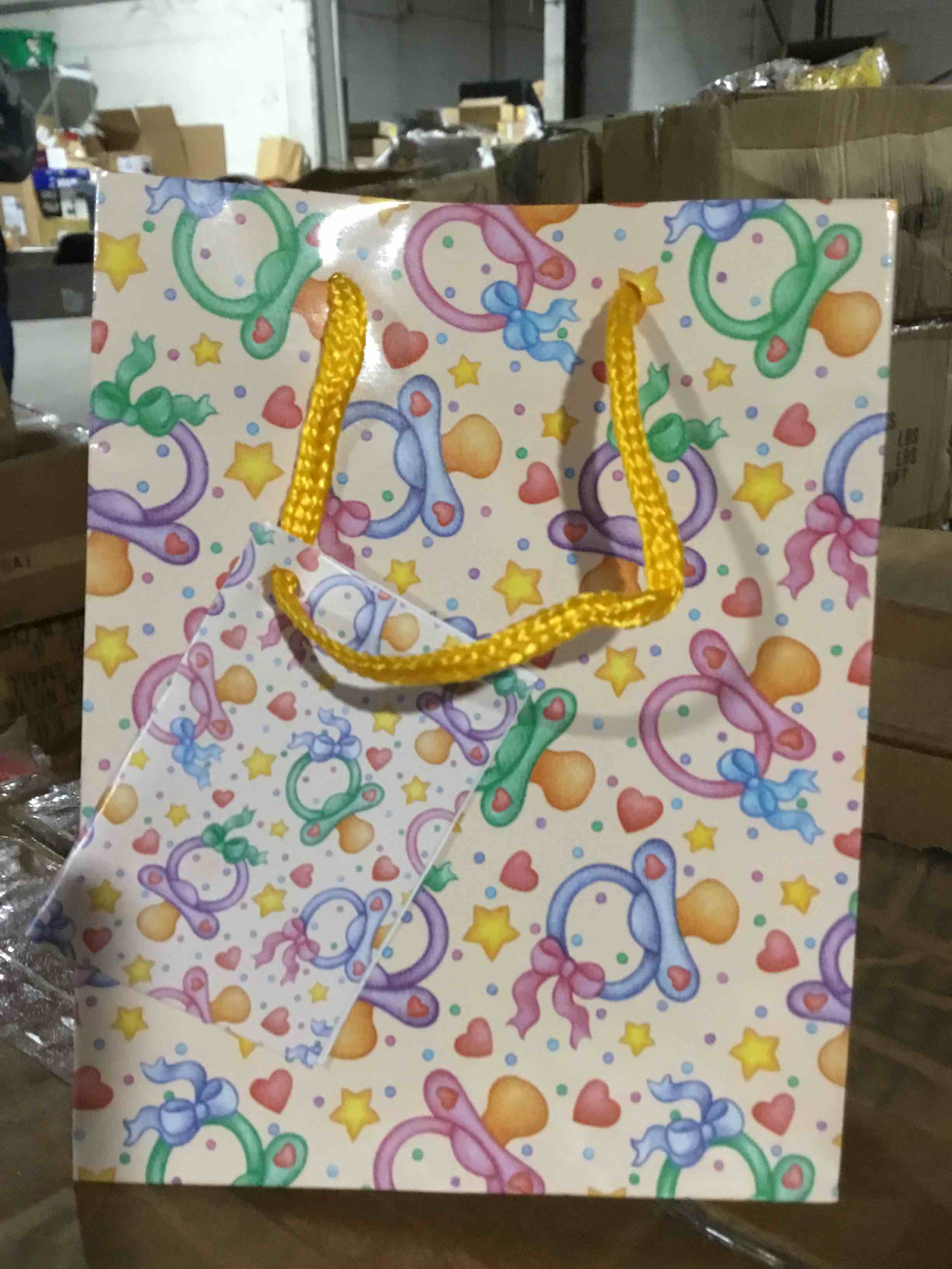 Box of 300 Small Gift Bags with a Baby Pacifier 
