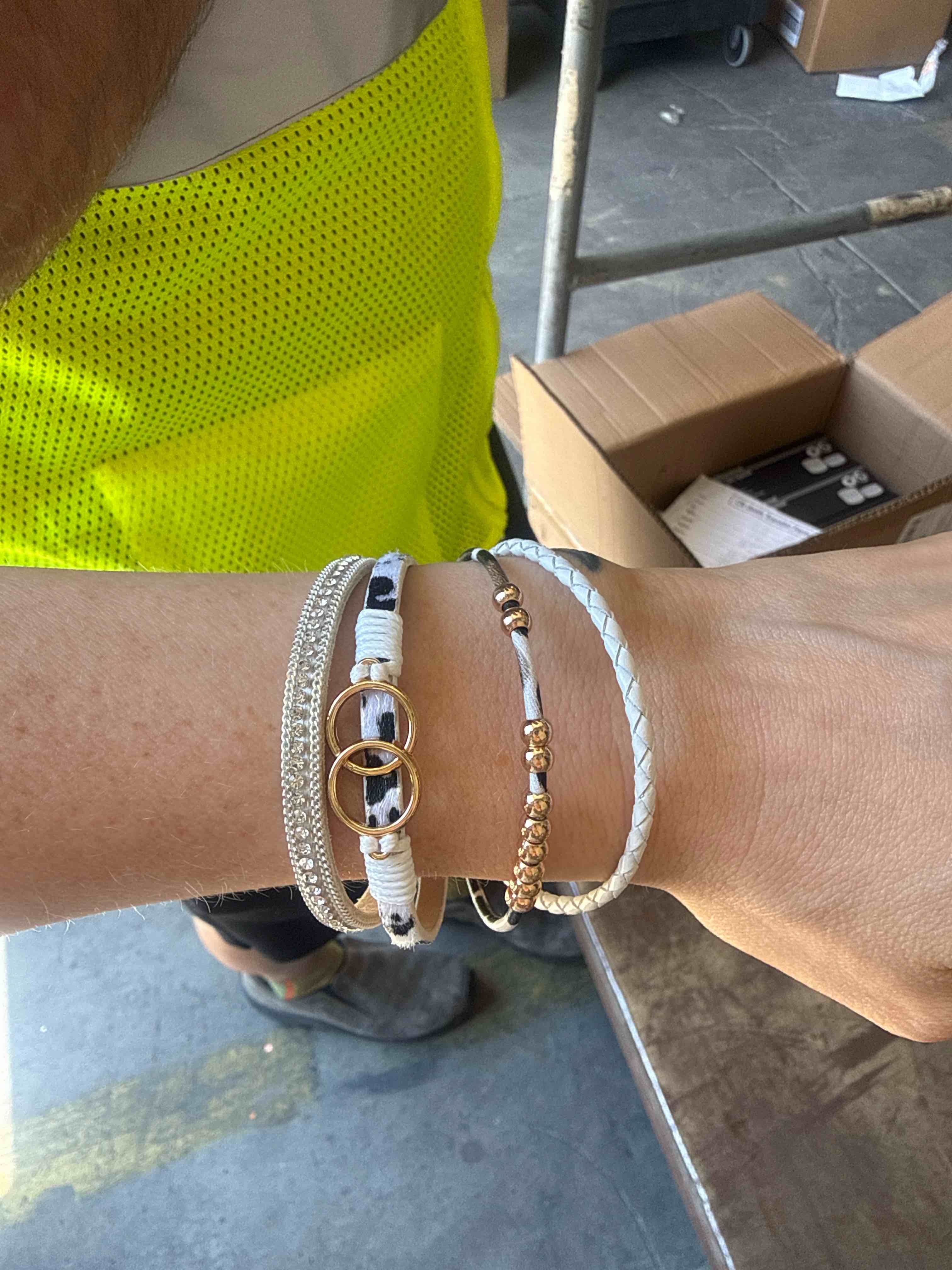 Condition photo showing Brand New for elevate any outfit with this stylish layered magnetic bracelet featuring sparkling rhinestones, braided leather, gold-tone accents, and trendy animal print for the perfect blend of elegance and everyday wear.