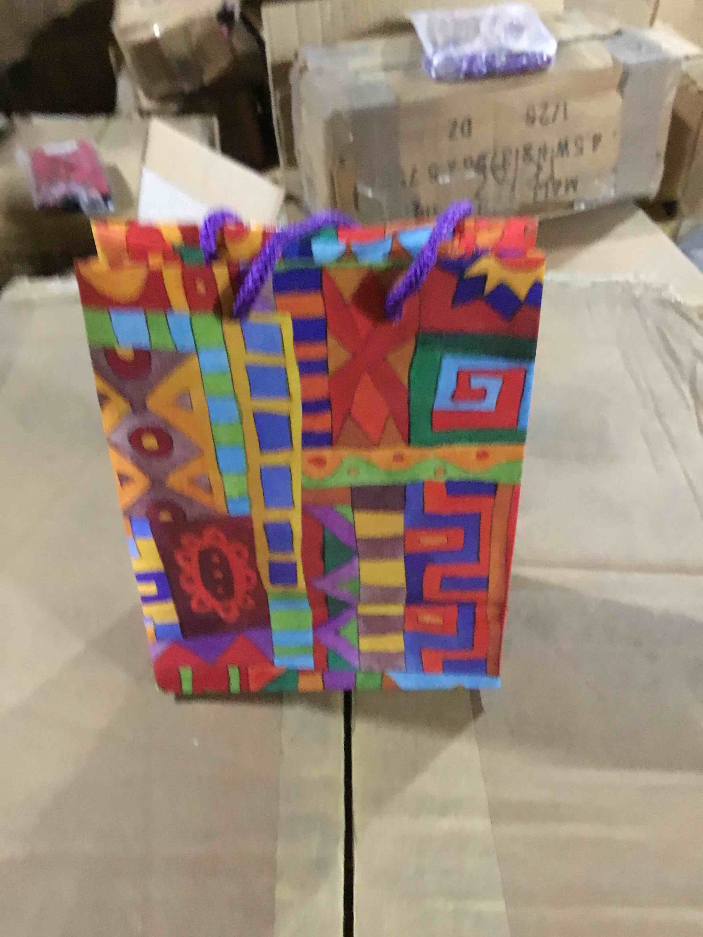 Box of 300 gift bags in various shapes and colors