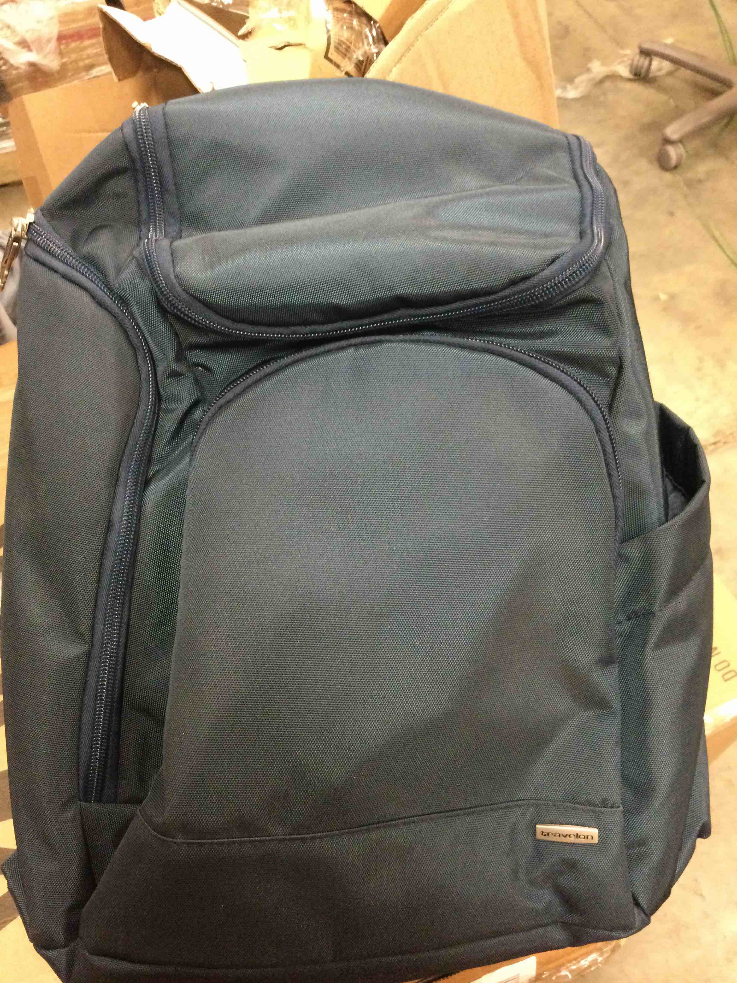 Condition photo showing New/Like New for travelon anti-theft classic backpack navy