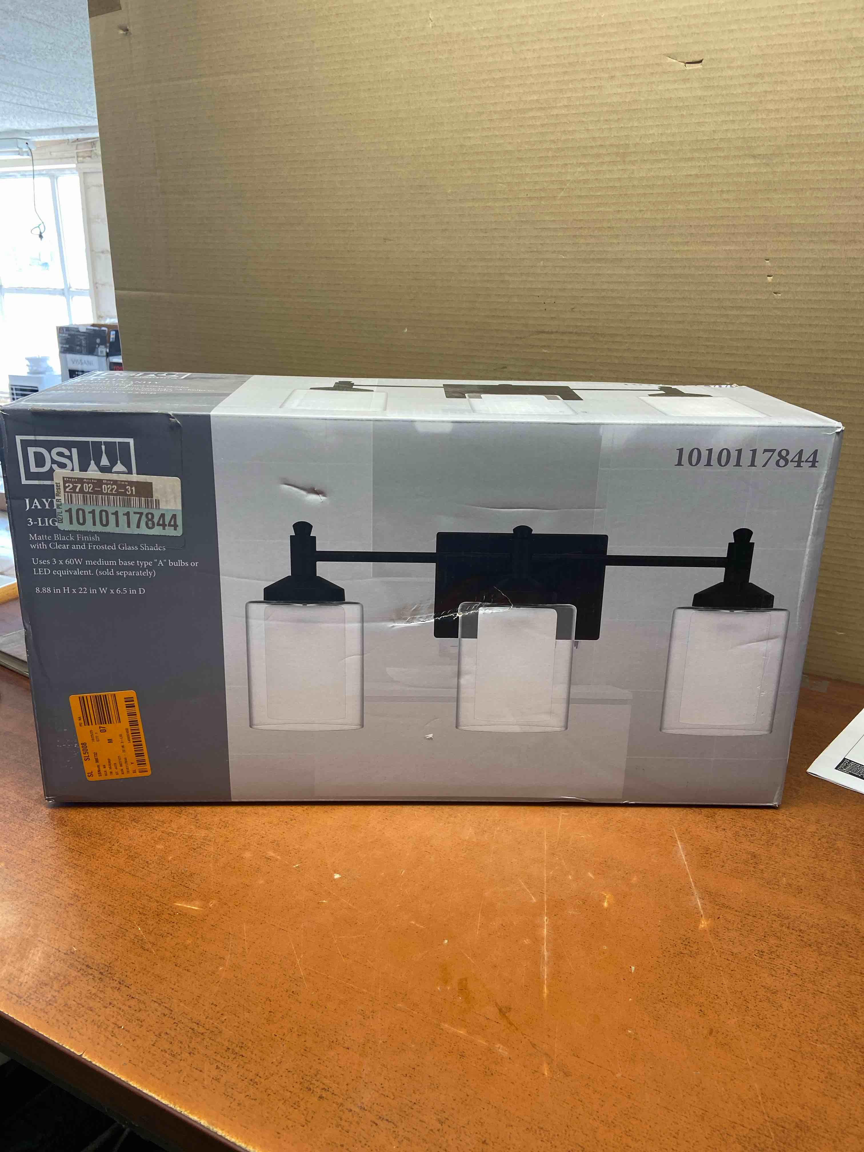 Condition photo showing New/Like New for dsi lighting 22 in. 3-light matte black vanity light with clear etched glass shades