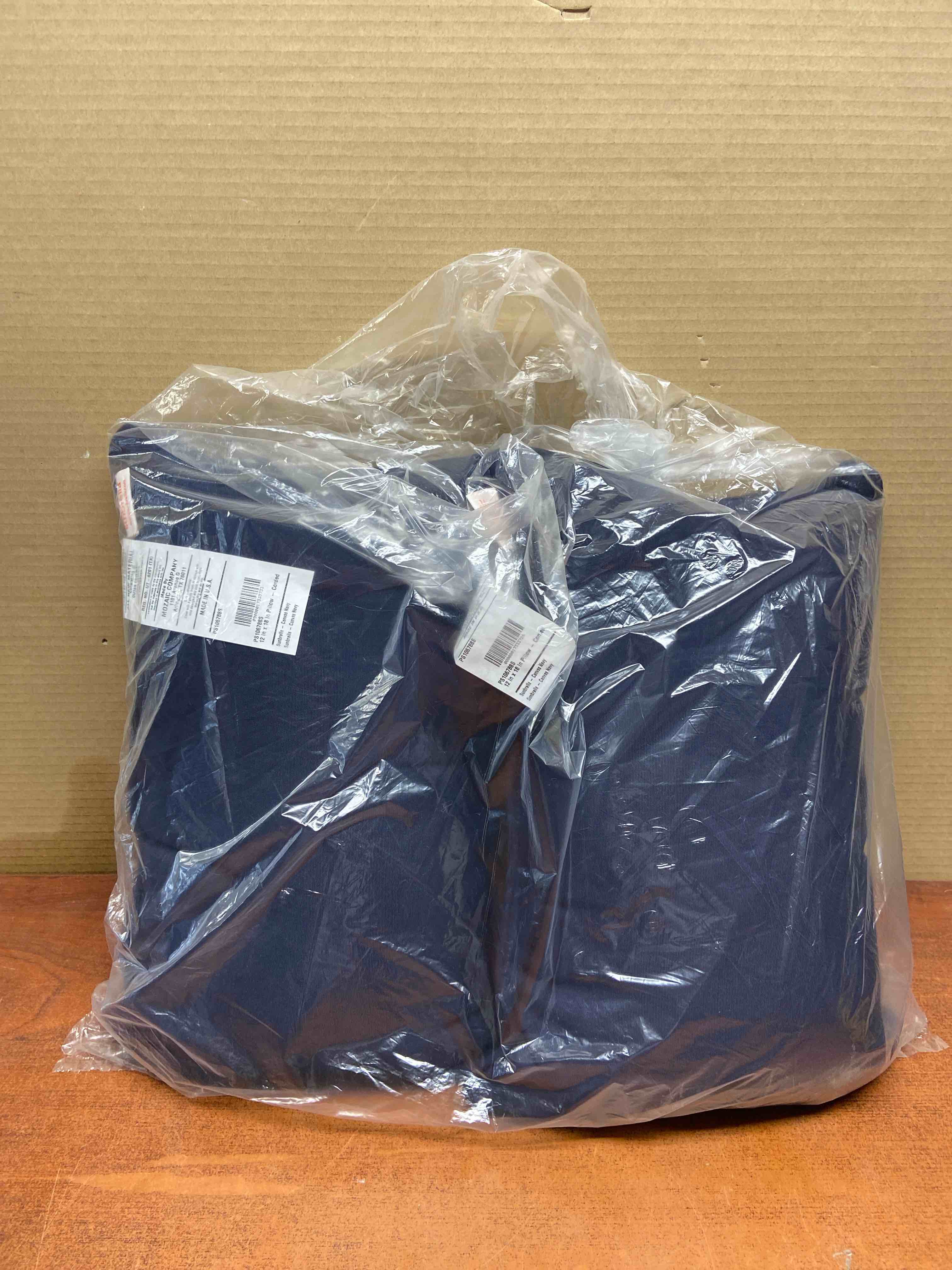 Condition photo showing New/Like New for sunbrella 12”x18” outdoor pillows 2 pack