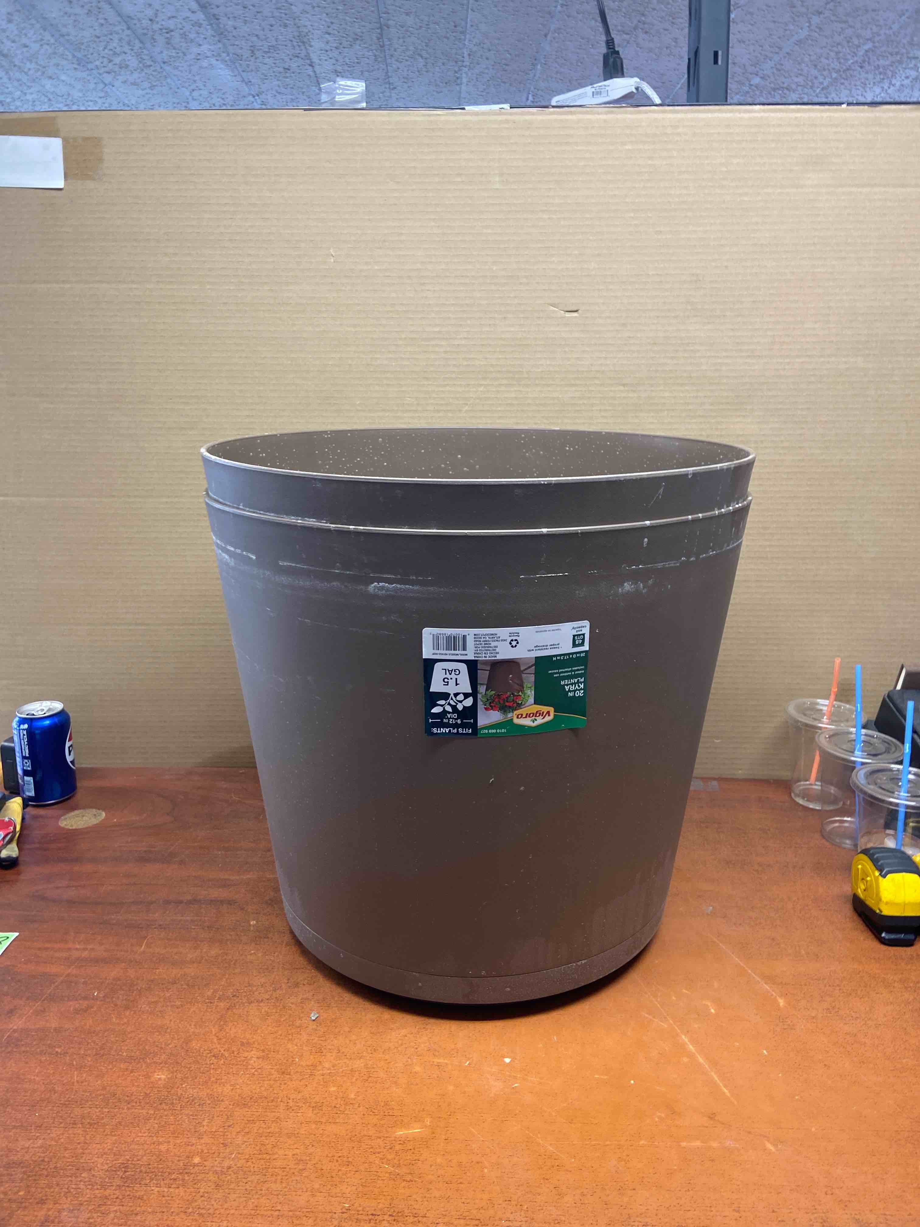 20 in. Kyra Large Chocolate Resin Planter (20 in. D x 17.3 in. H) with Attached Saucer