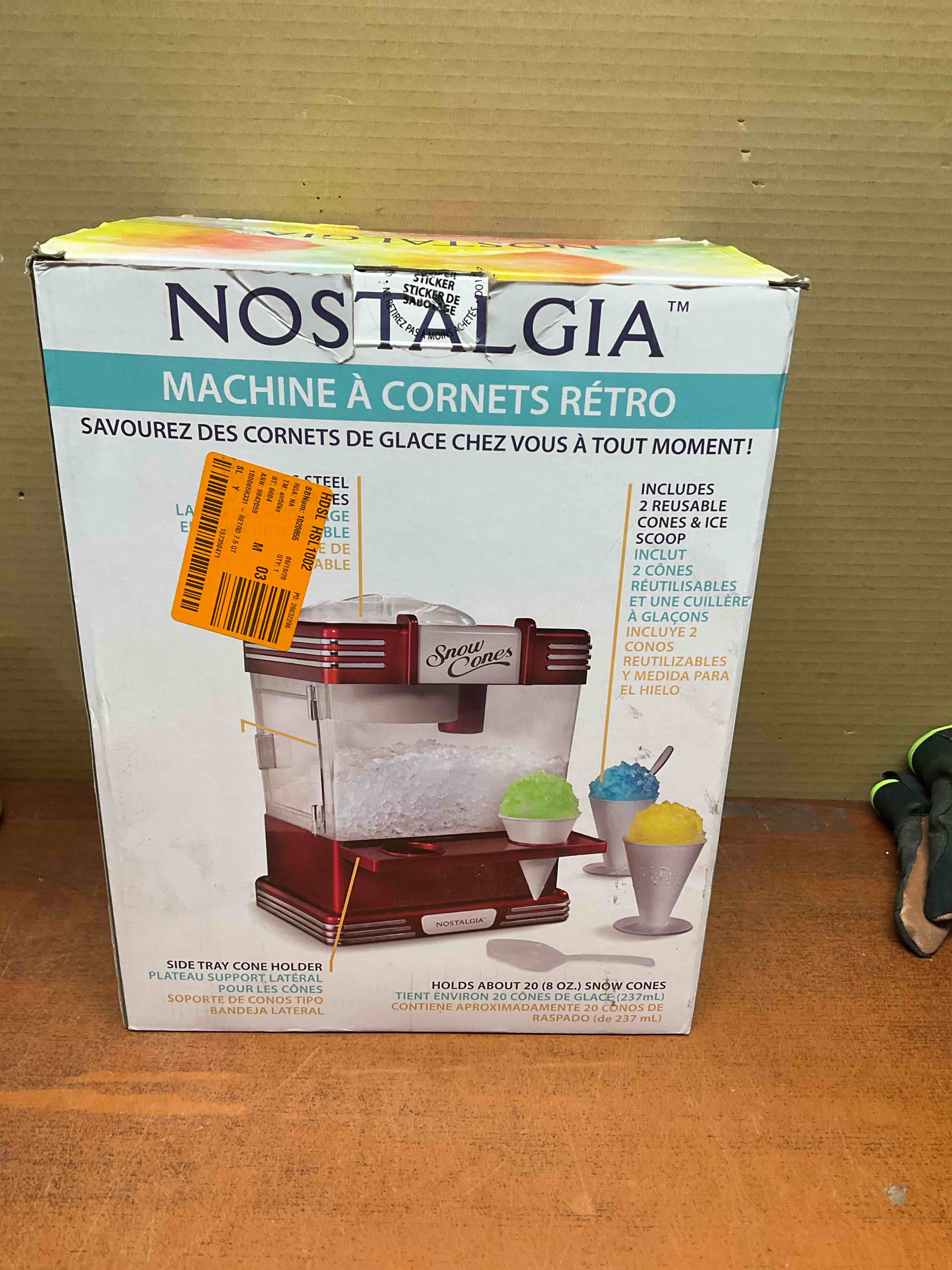 nostalgia snow cone maker tabletop shaved ice machine with 2 reusable cones and ice scoop red