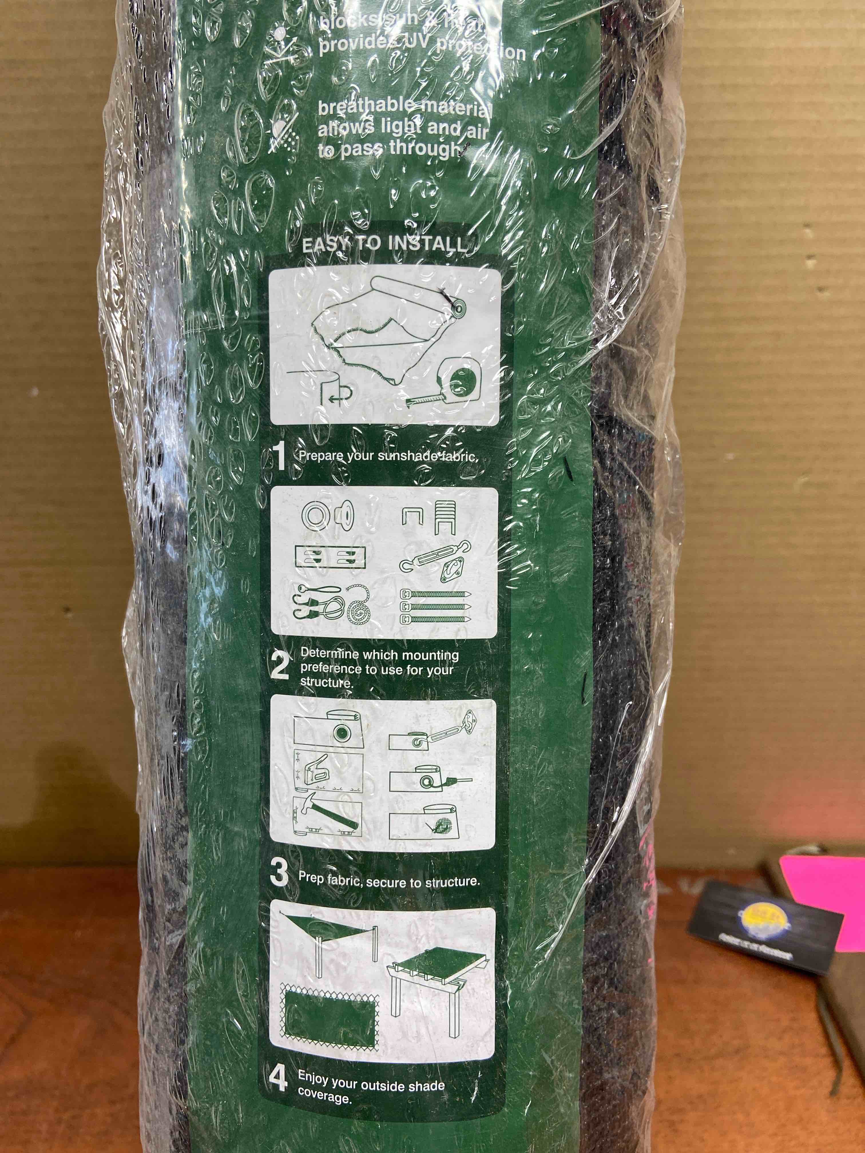 Condition photo showing New/Like New for 6 ft. x 50 ft. Black Sun Shade Fabric Shade Cloth