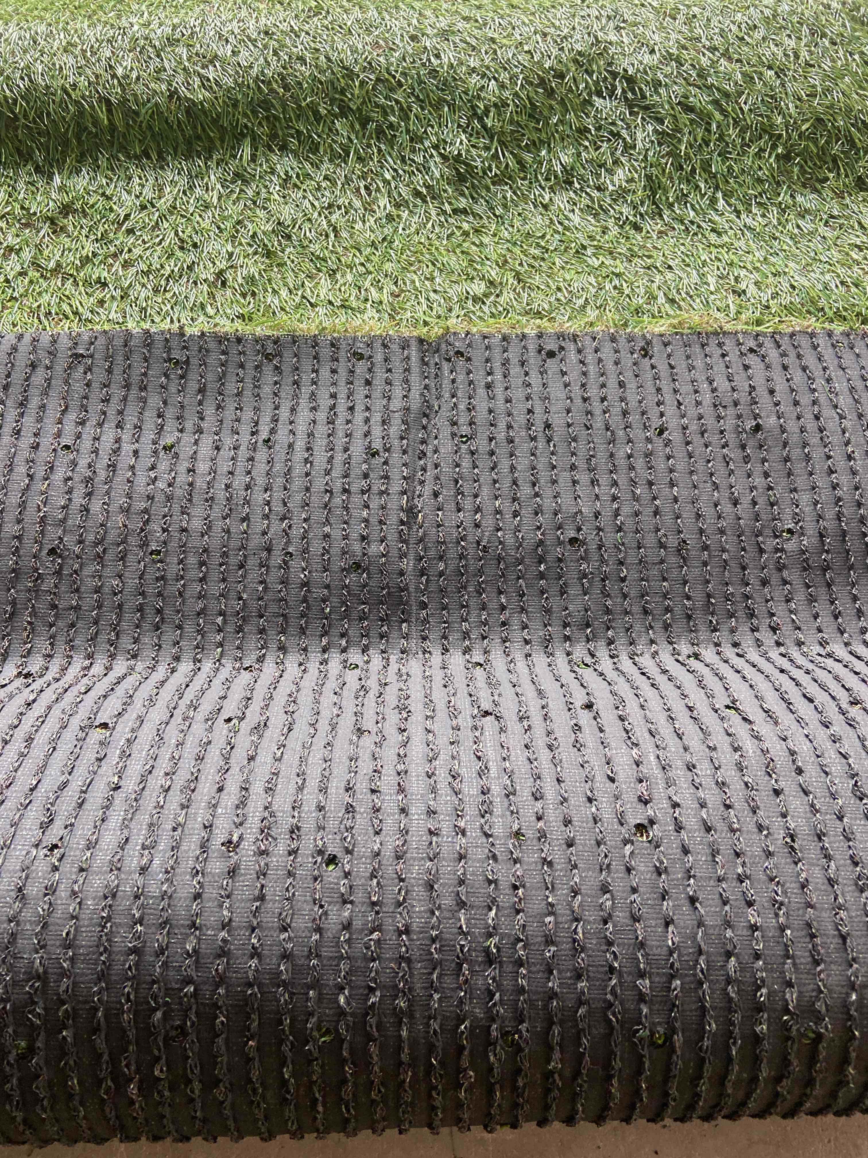 Condition photo showing New/Like New for Evergreen company 32”x 9’ artificial turf 
