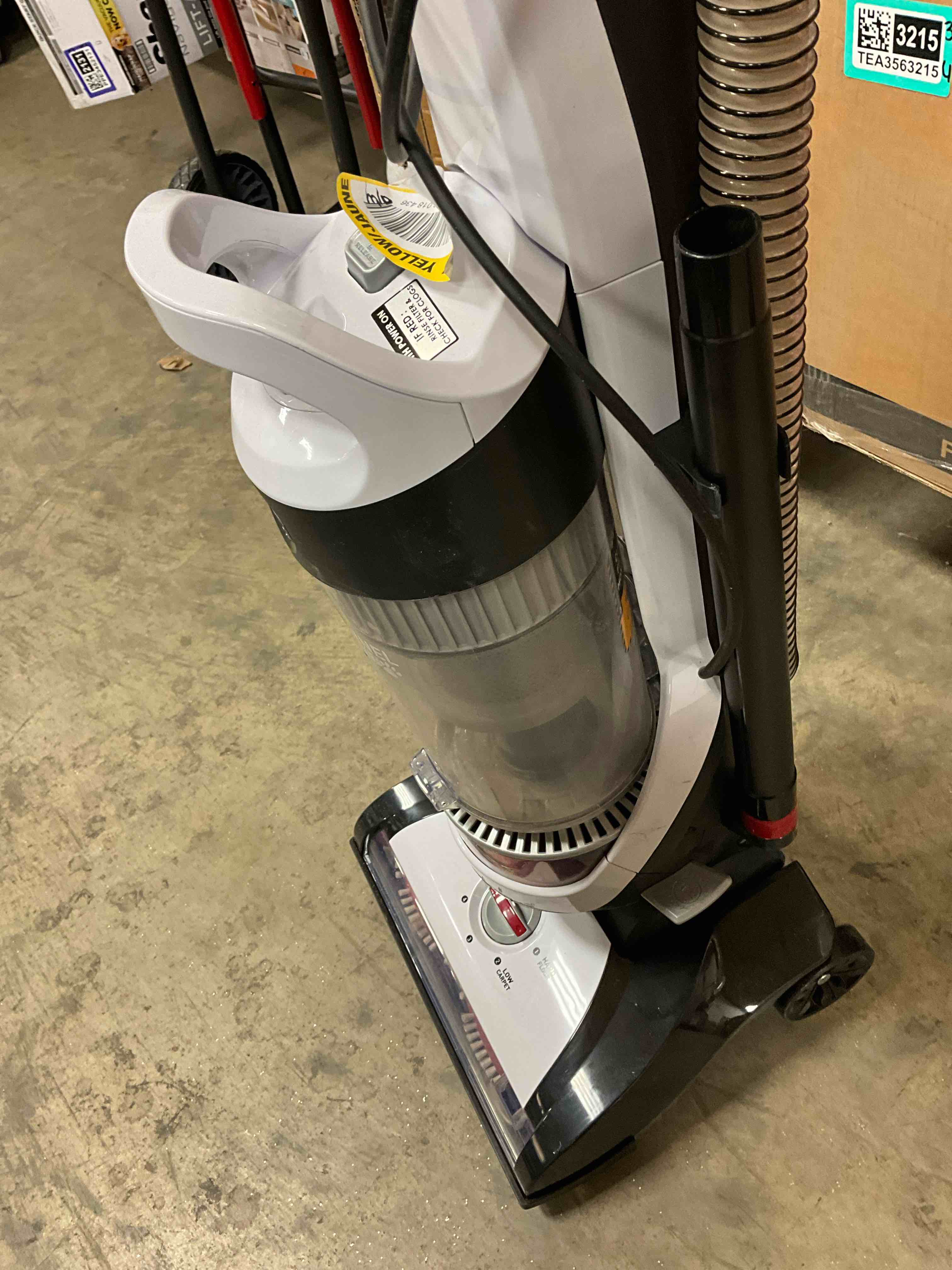 Condition photo showing Good Condition for Working Condition Verified. No Attachments. WindTunnel Bagless Pet Upright Vacuum Cleaner with Automatic Cord Rewind For Carpet, Hardwood, and Upholstery