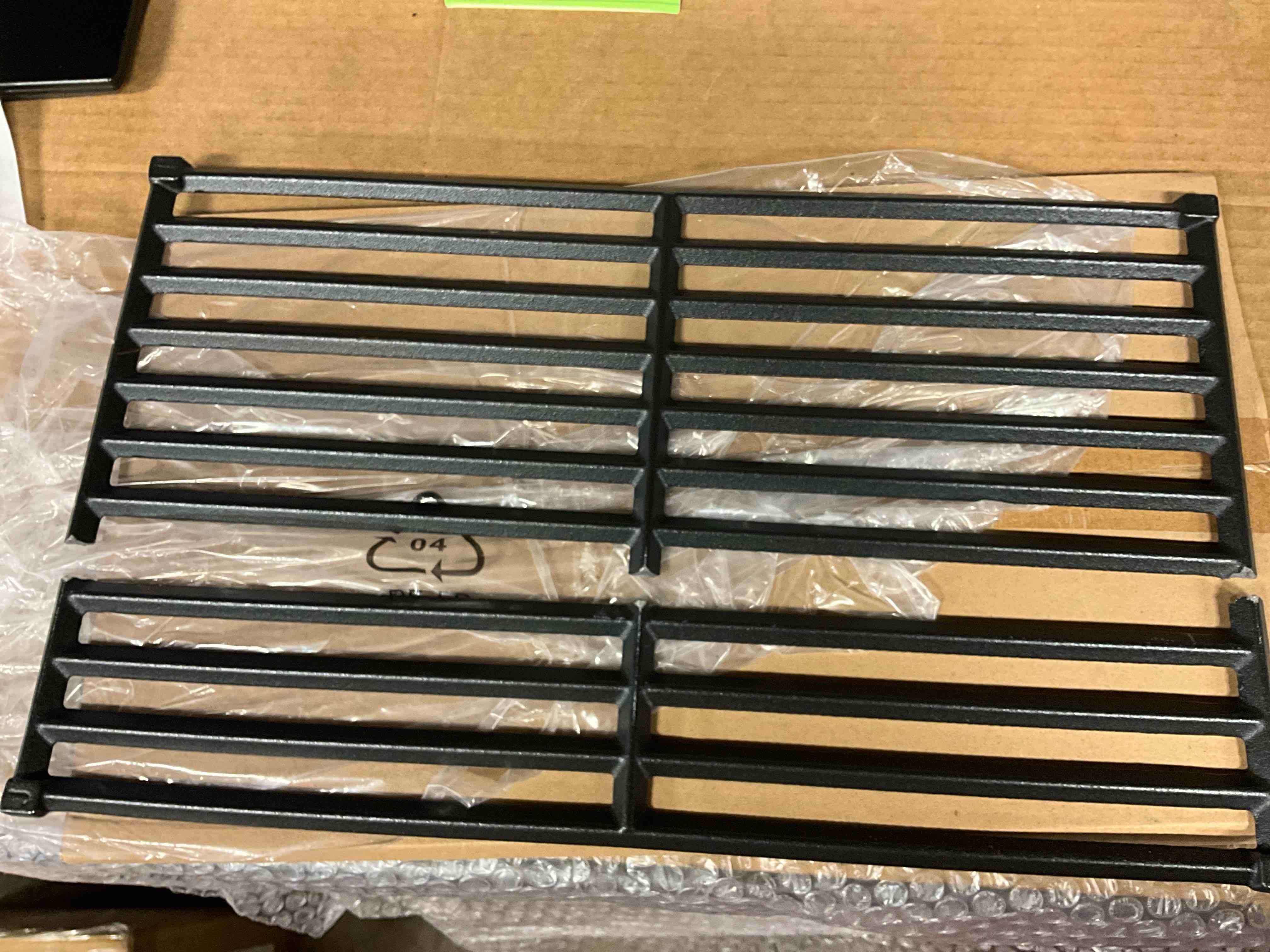 Condition photo showing As Is for 16.3 in. x 9.5 in. rectangle porcelain-coated cast iron grilling grate