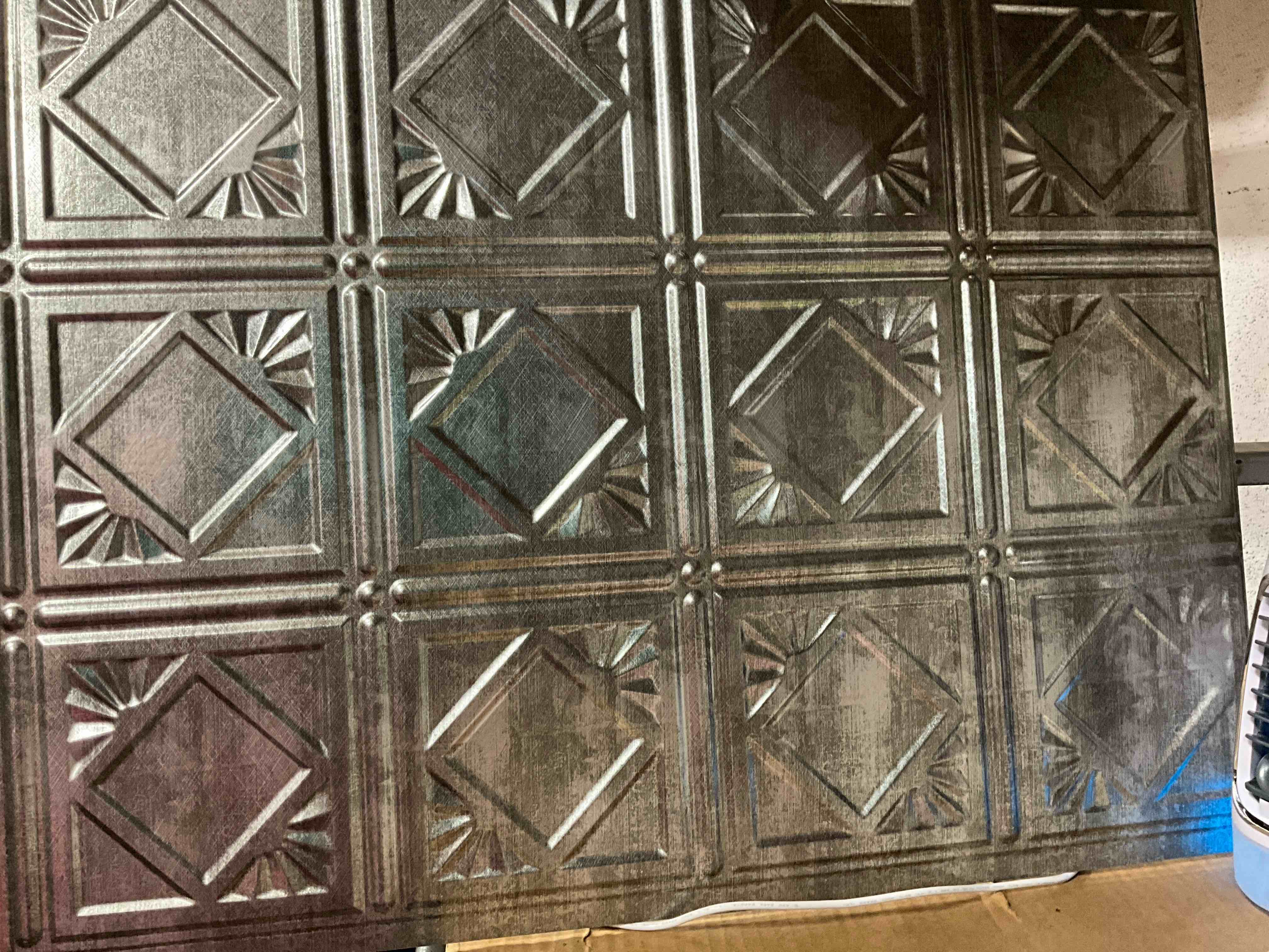 Condition photo showing New/Like New for 18.25 in. x 24.25 in. crosshatch silver traditional style # 4 pvc decorative backsplash panel