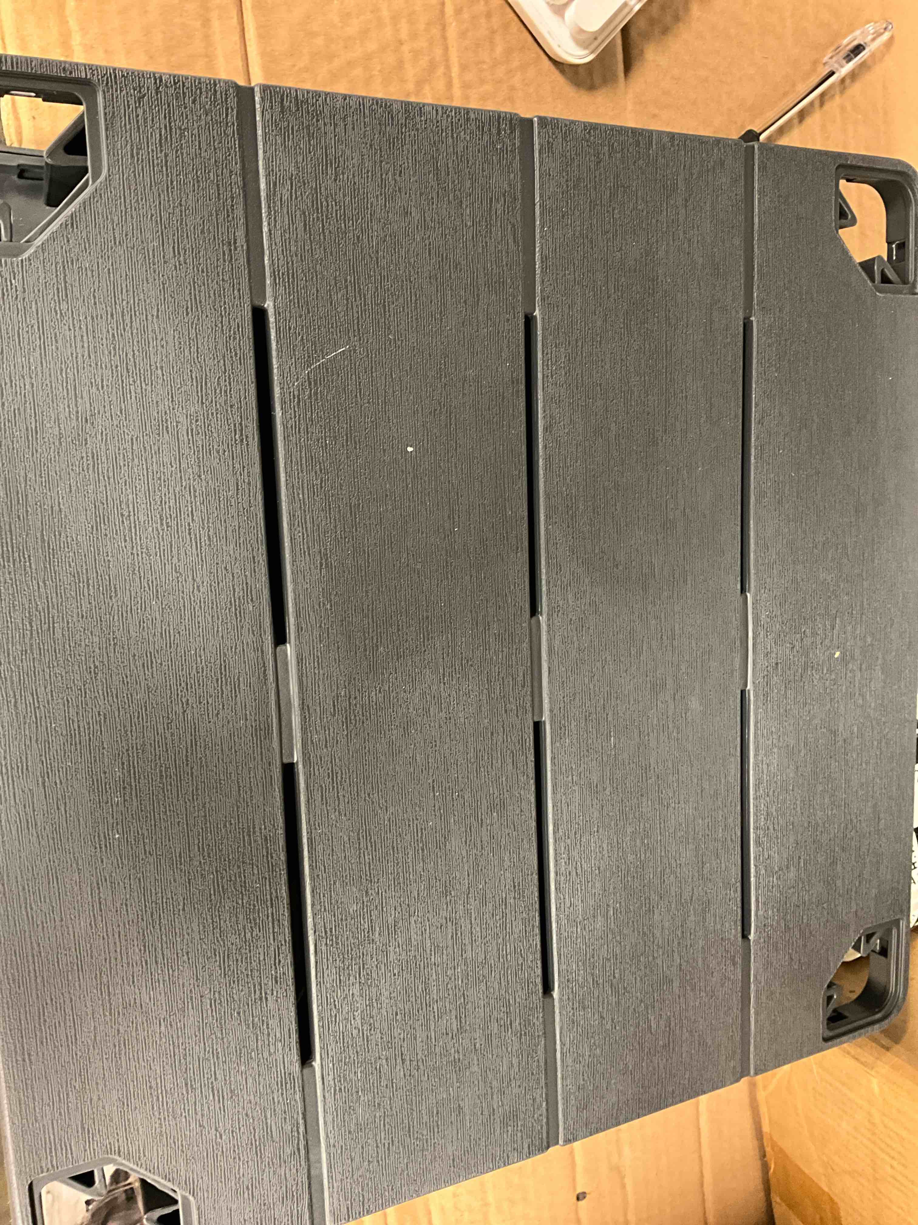 Condition photo showing New/Like New for deluxe 20 in. resin graphite square patio side table with storage