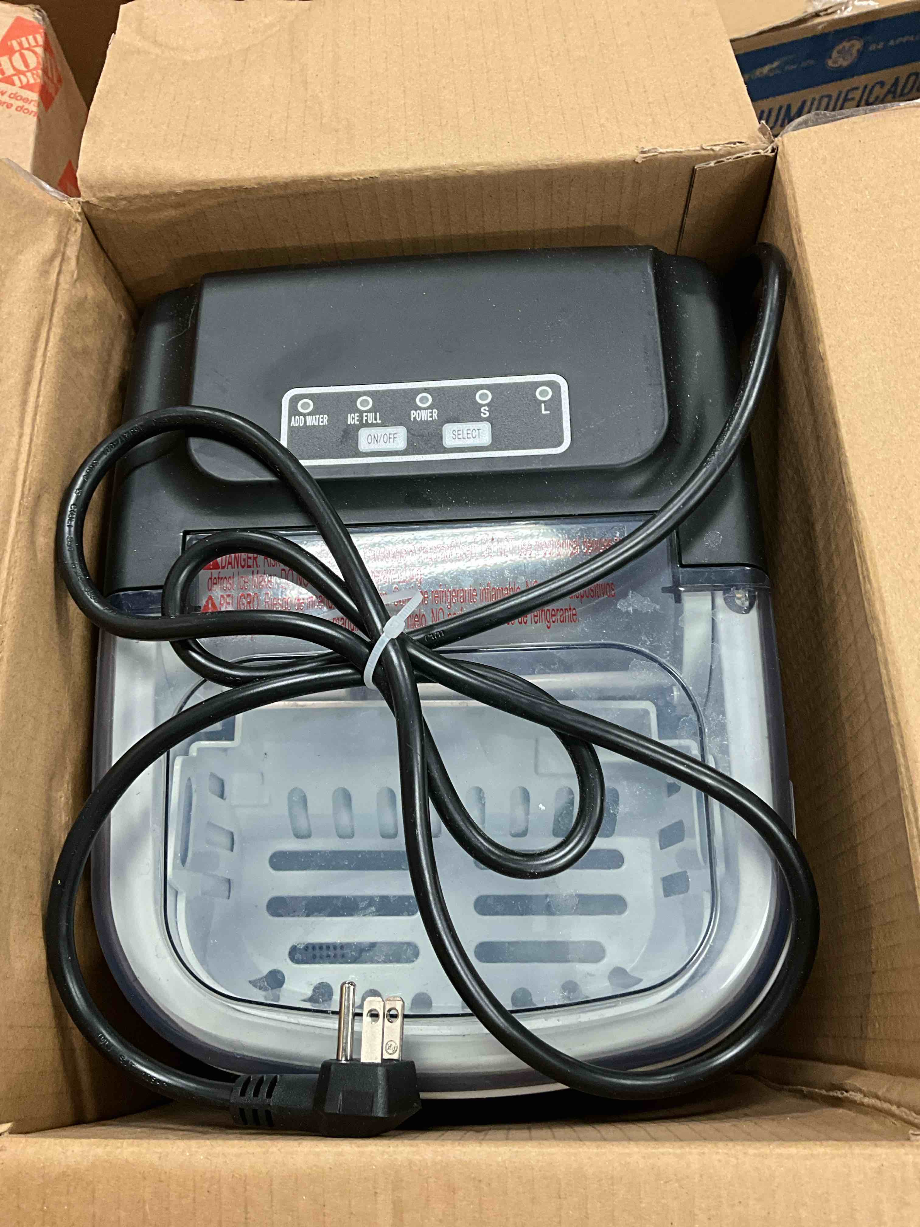 Condition photo showing As Is for Previously owned. 27 lbs. Bullet Ice Countertop Ice Maker in Stainless Steel