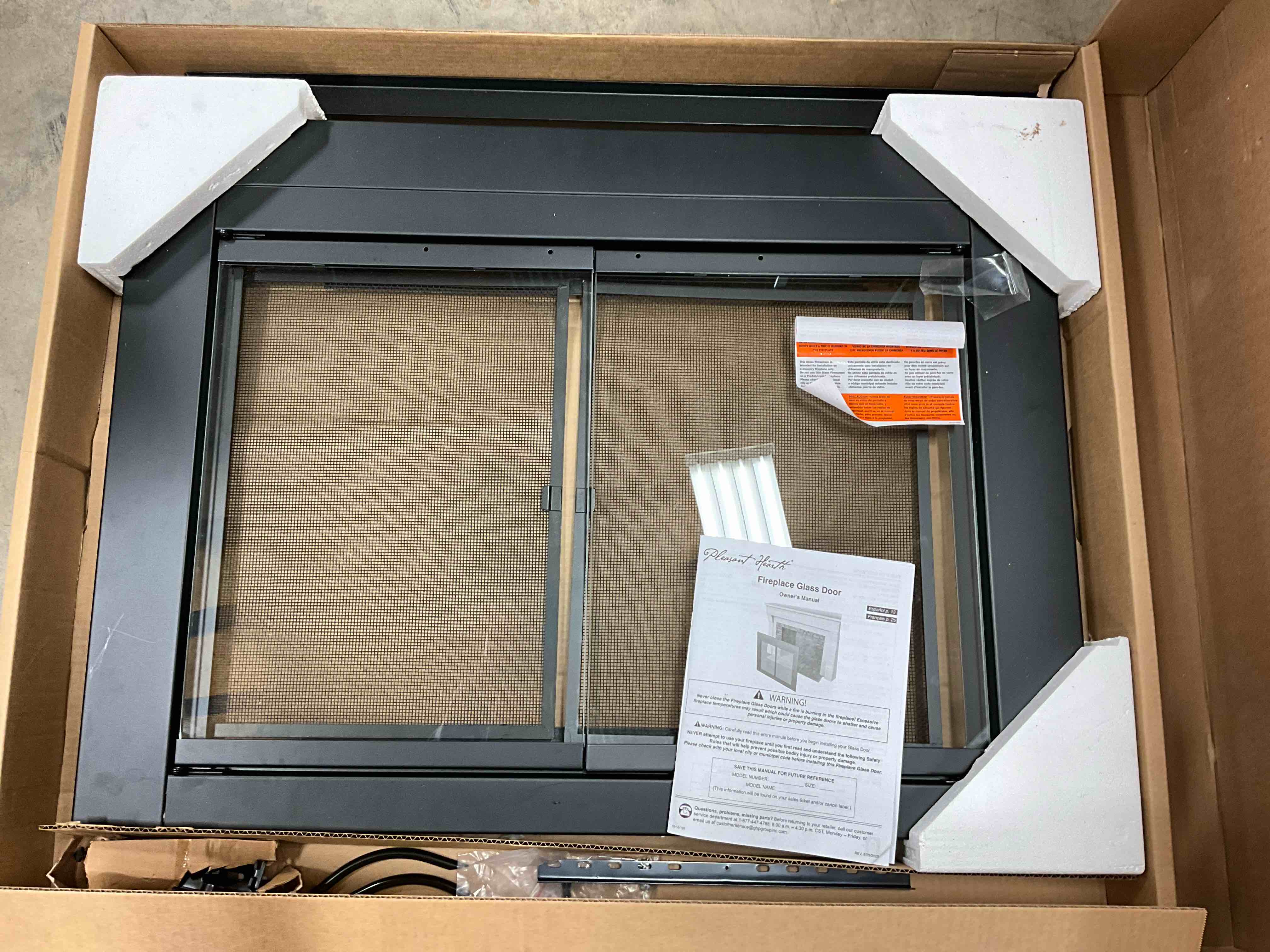 Condition photo showing Good Condition for Missing one hex bolt. Pleasant Hearth AN-1010 Alpine Fireplace Glass Door, Black, Small Black Small Door