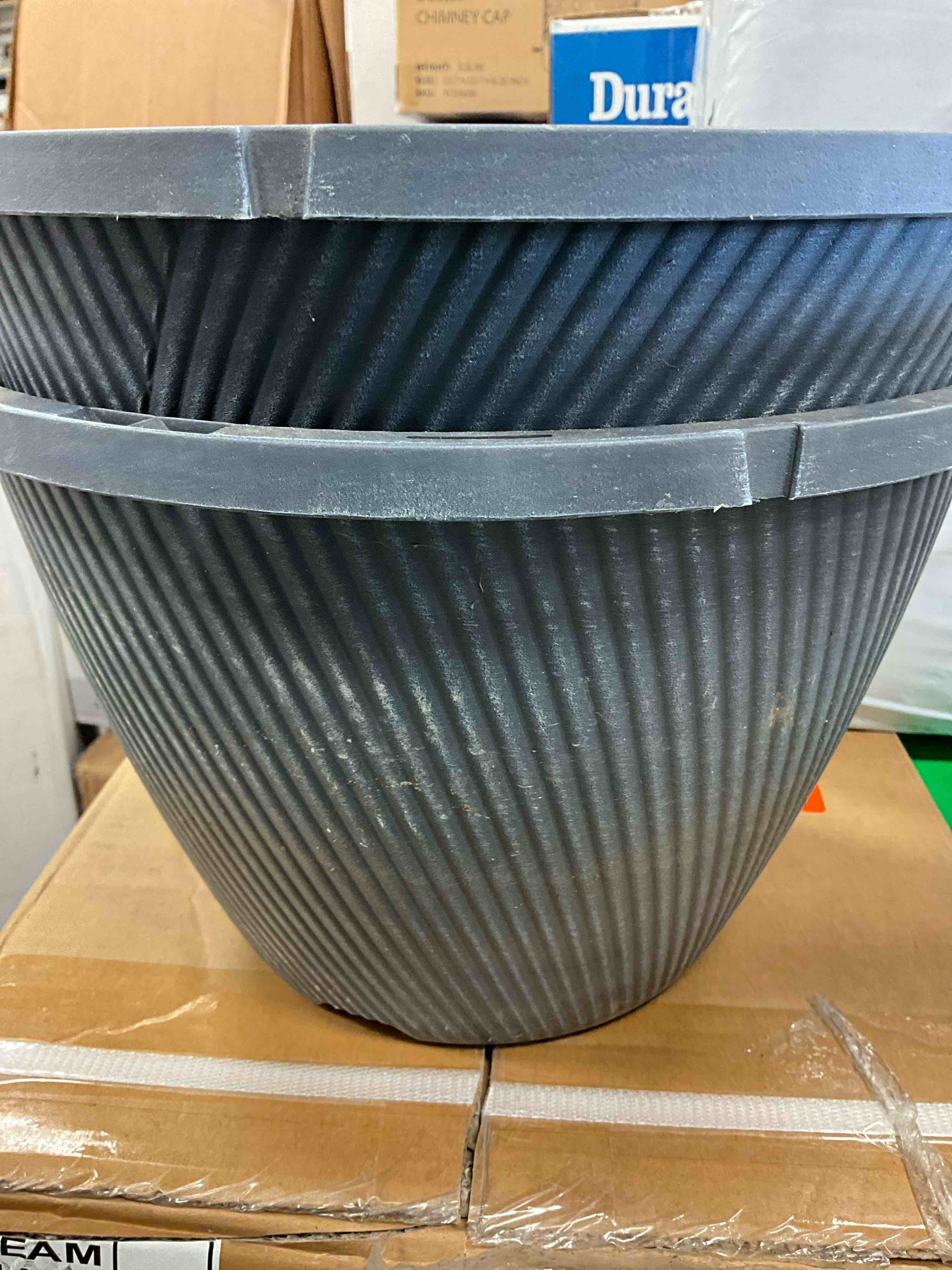 Condition photo showing Good Condition for Previously Owned. No Hangers. Vigoro 12 in Black Plastic Hanging Basket (2 Pack) 