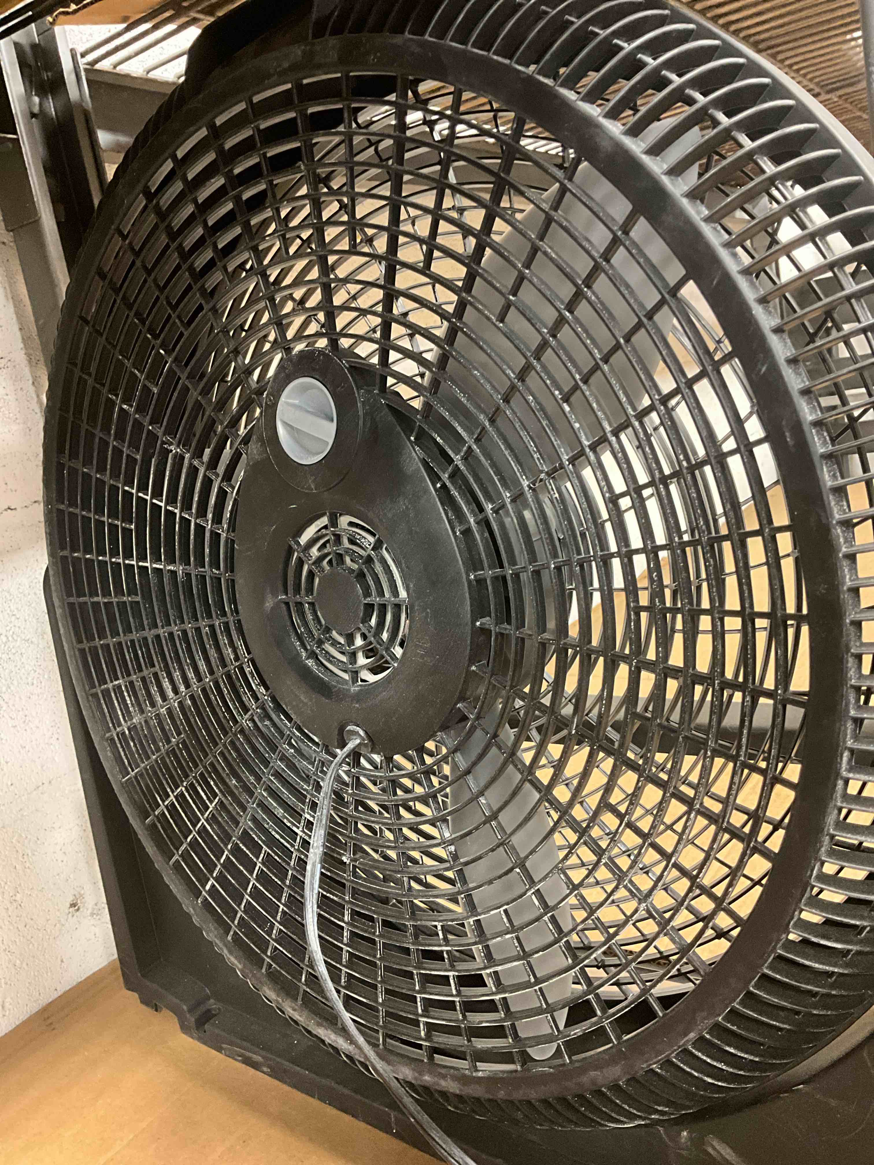 Condition photo showing Good Condition for previously owned. no feet. working condition verified. 20 in. 3 speed air circulator floor fan for home in black with wall mount option, full range pivoting head, carry handle