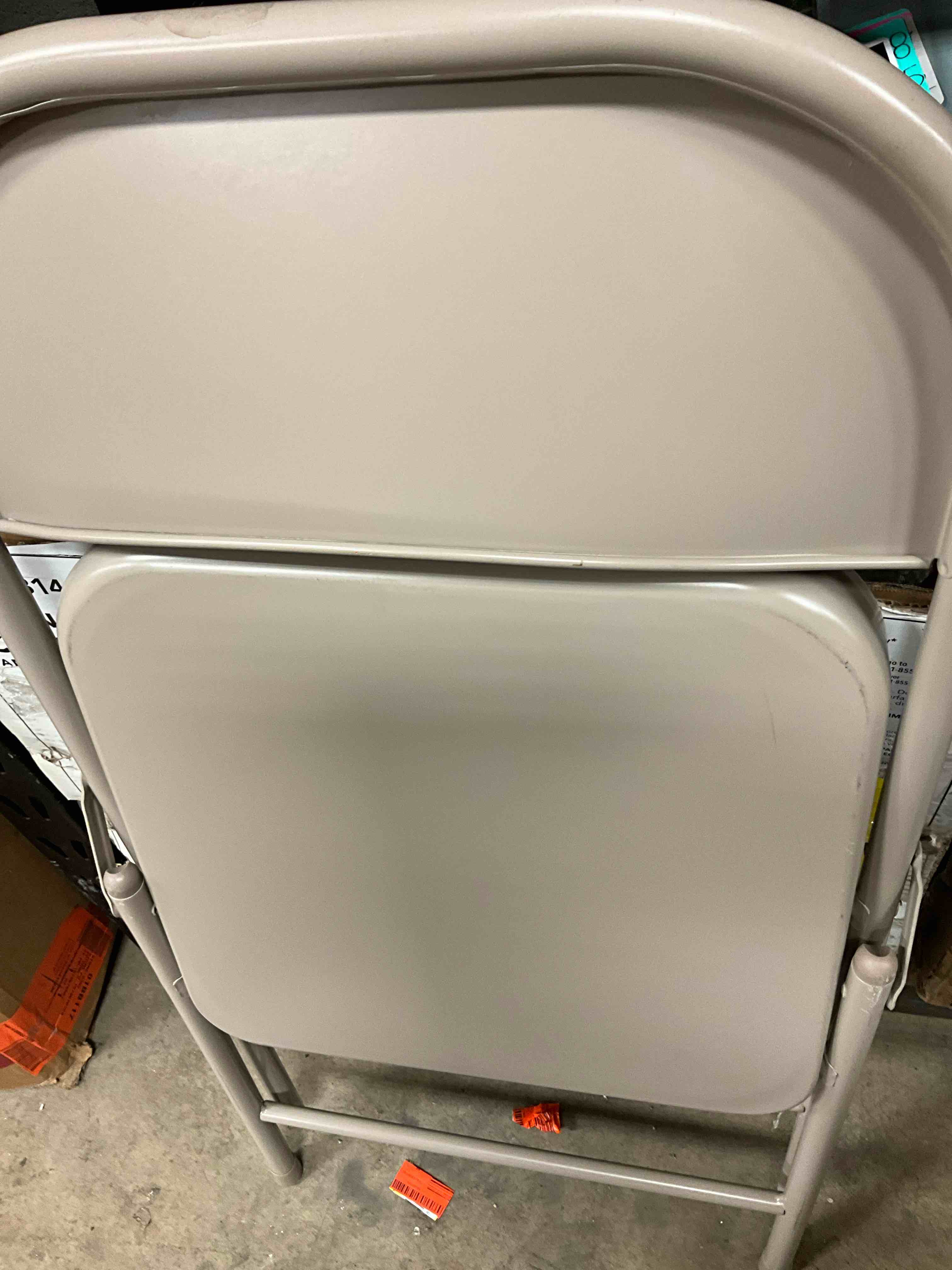 Condition photo showing New/Like New for steel folding chair-beige