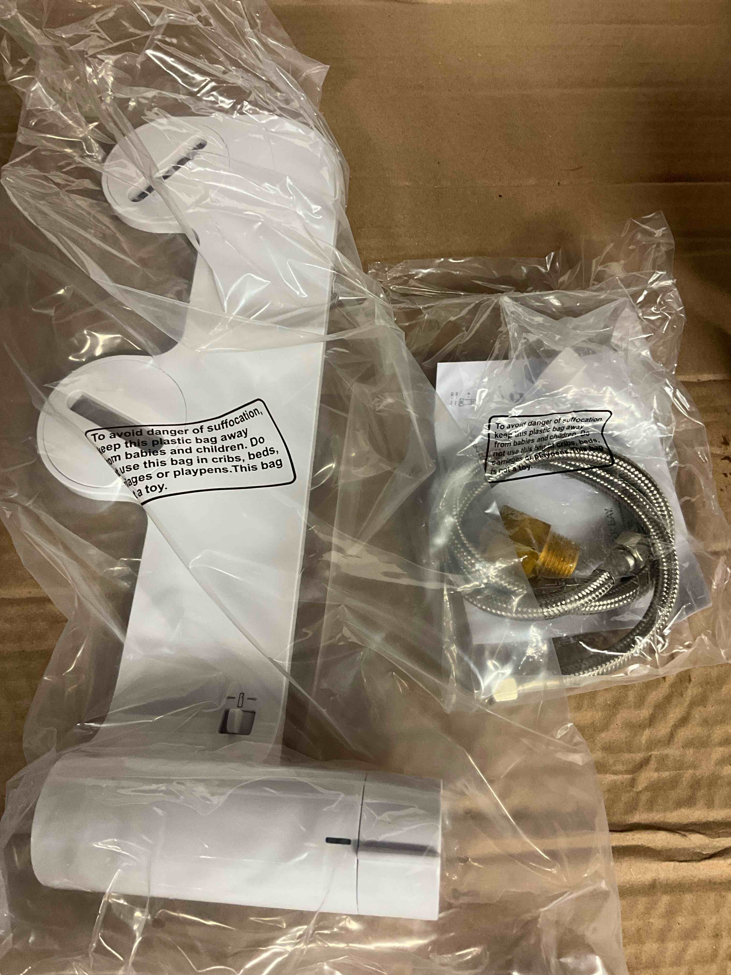 Condition photo showing New/Like New for slim non-electric bidet attachment in white with self cleaning