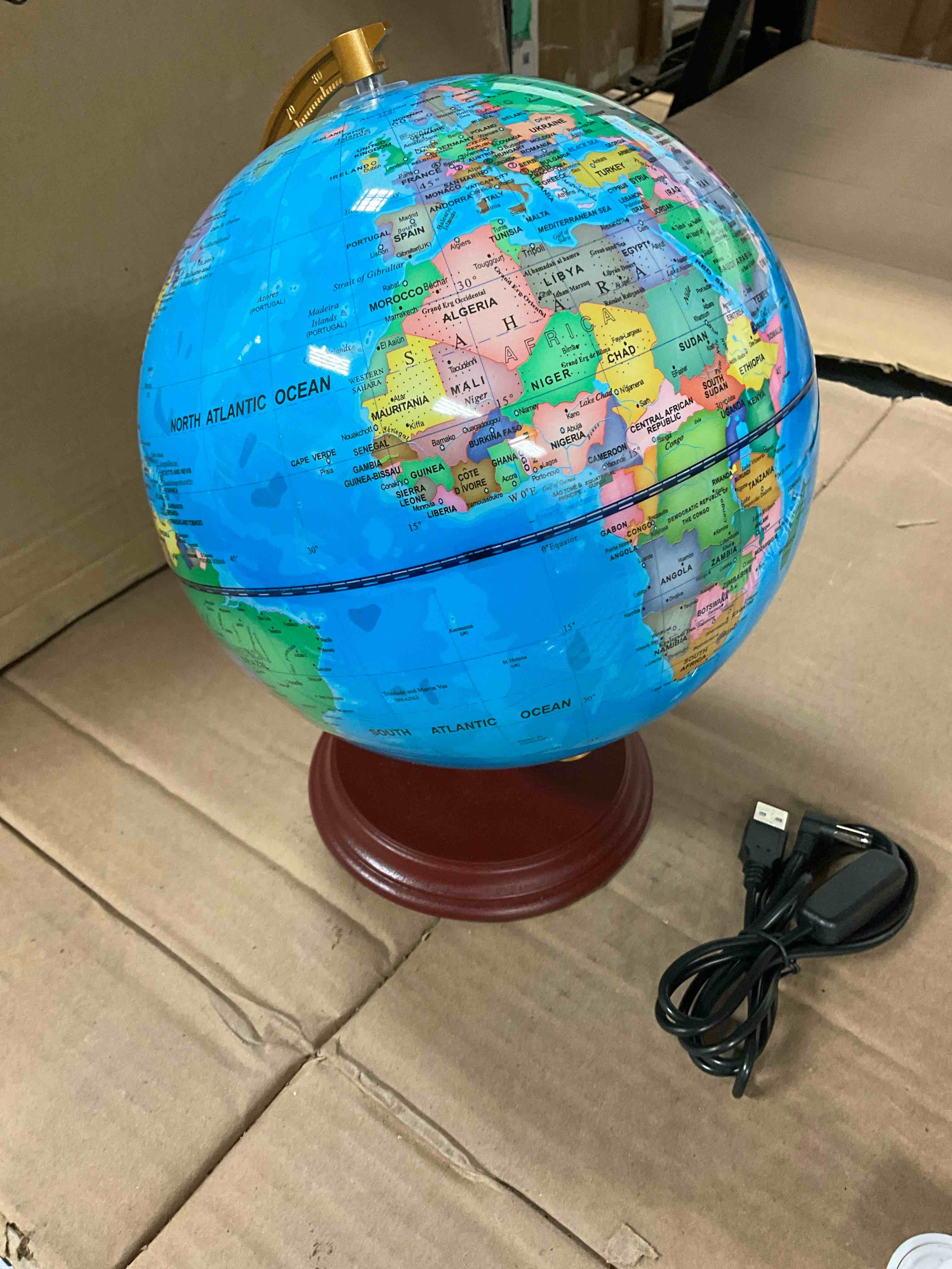 Condition photo showing New/Like New for working condition verified. 10.5 in. illuminated world globe night light up globe lamp wooden stand and hd map blue