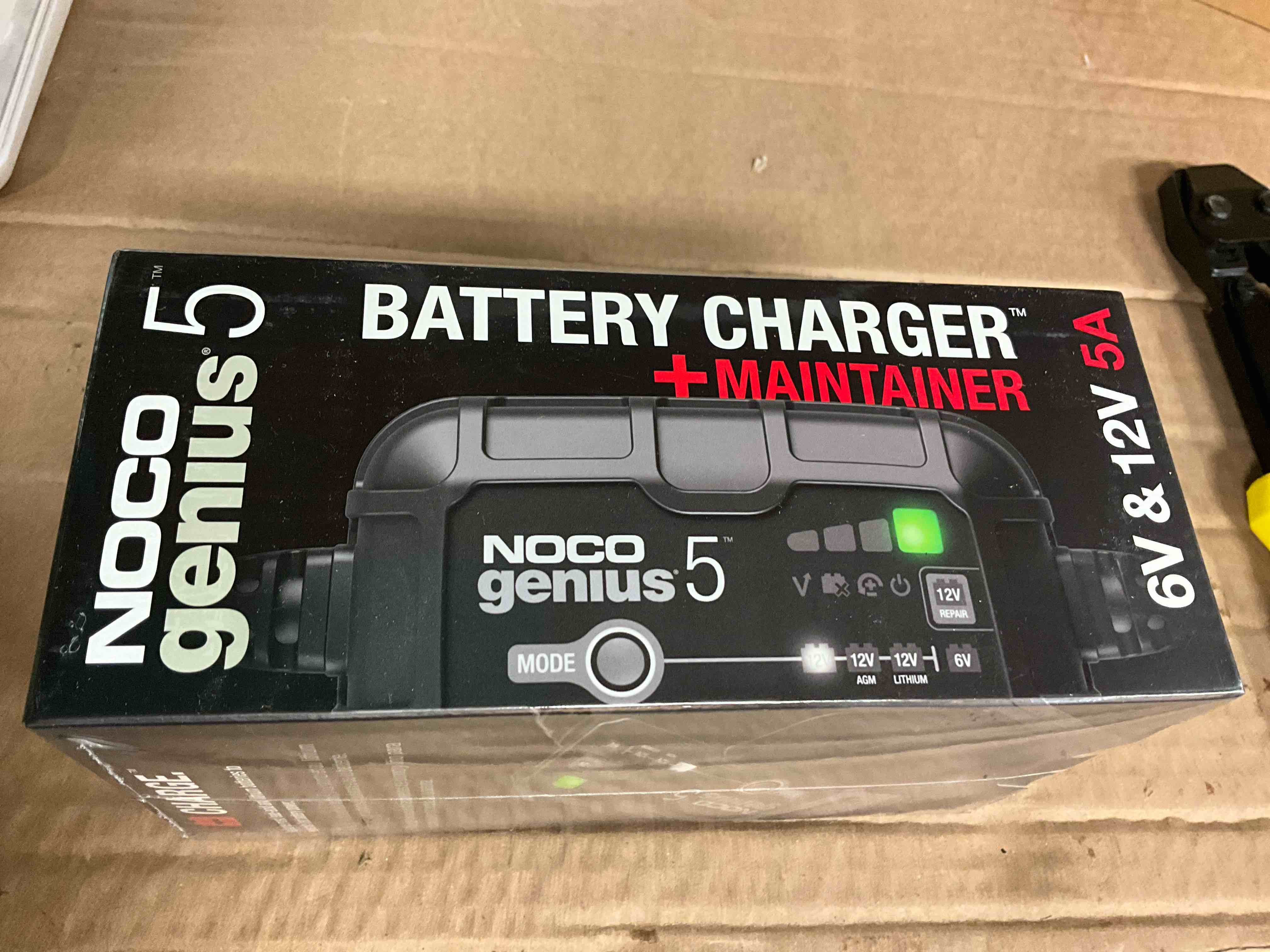 Condition photo showing New/Like New for noco genius5: 5a 6v/12v smart battery charger – automatic maintainer, trickle charger & desulfator with overcharge protection & temperature compensation – for lead-acid & lithium batteries