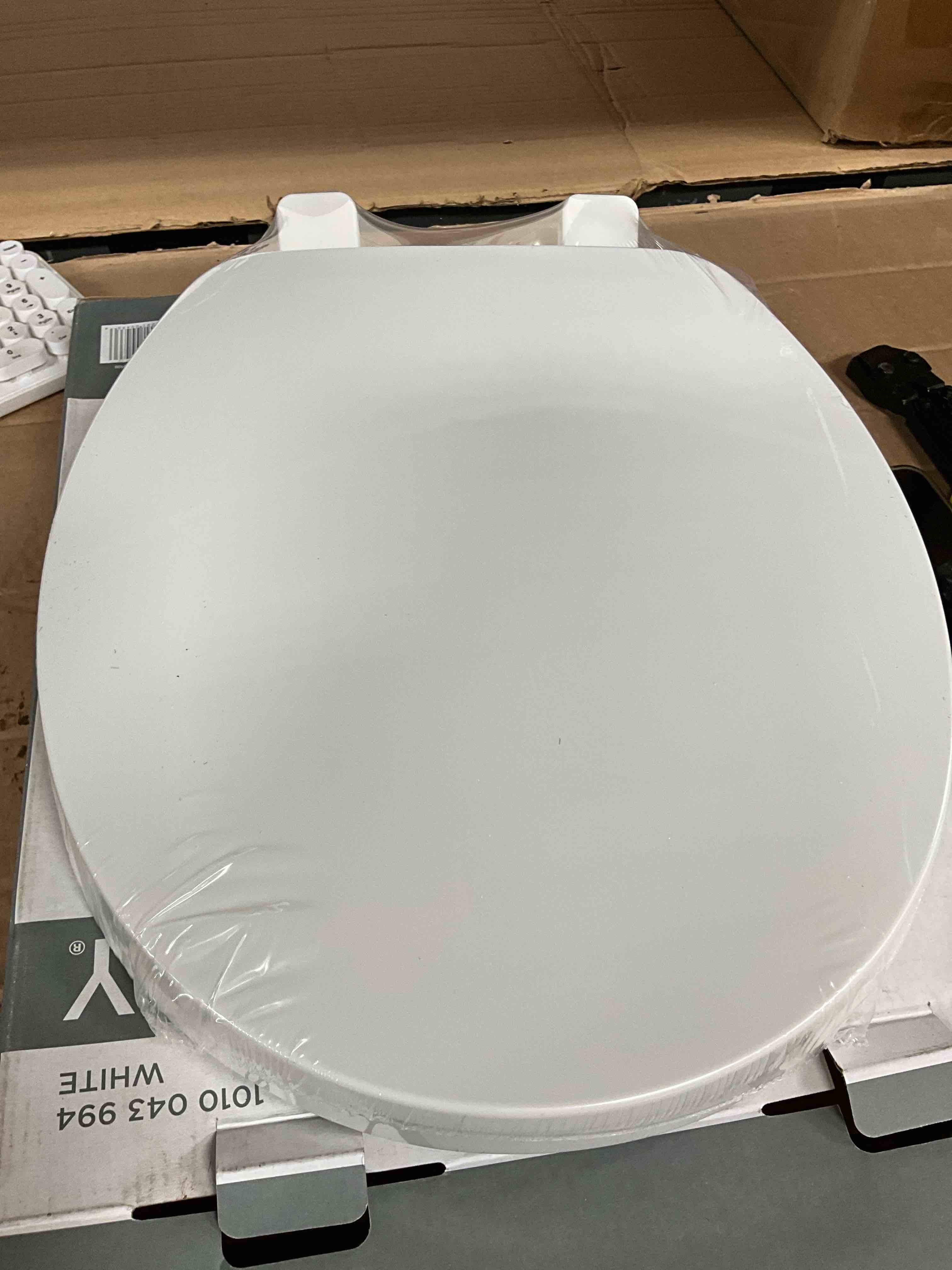 Condition photo showing New/Like New for glacier bay round front slow-close closed front toilet seat in white