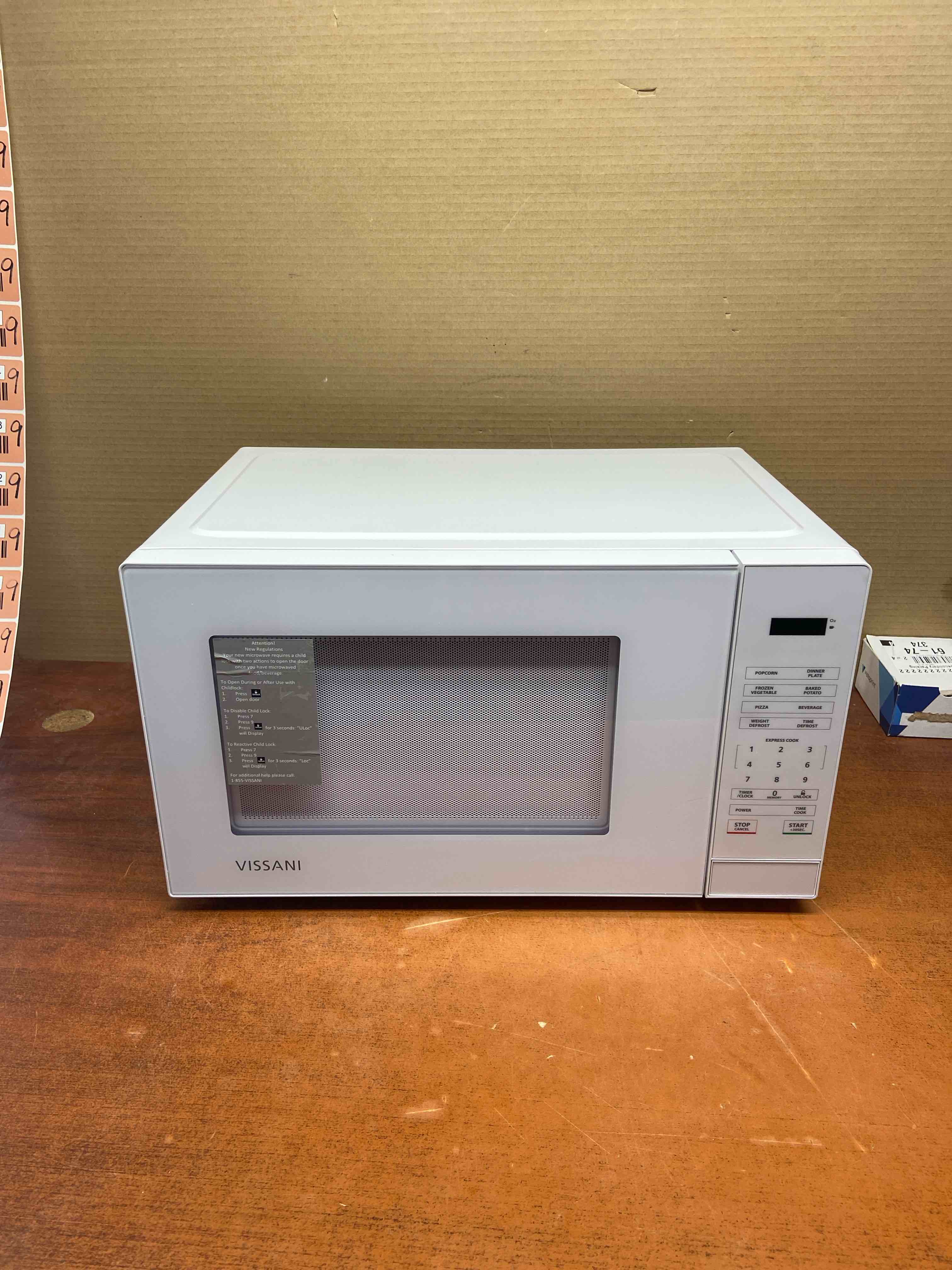 1.1 cu. ft. countertop microwave oven in white