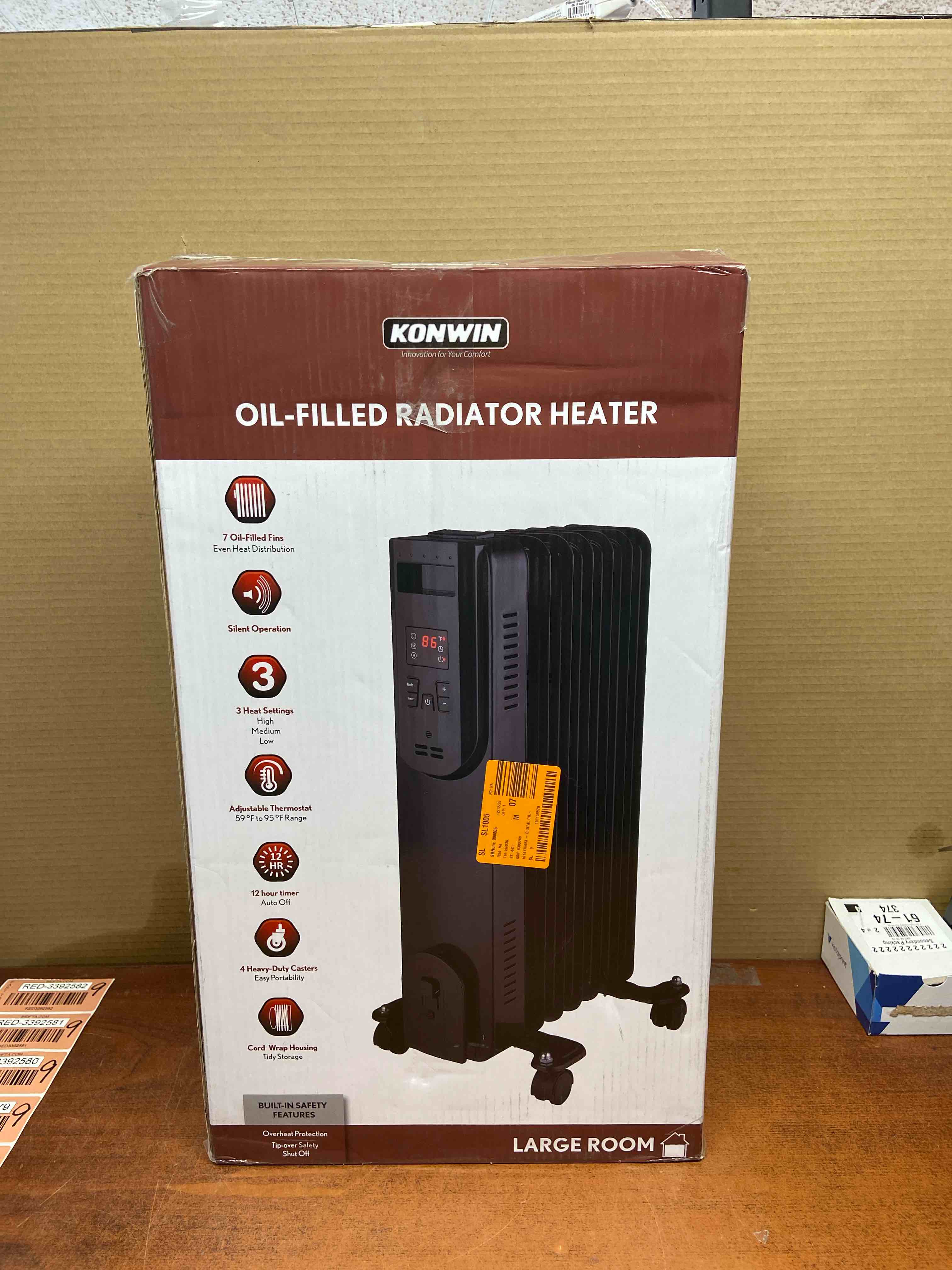 1500-watt black indoor electric oil-filled radiator convection radiant space heater with remote control for living space