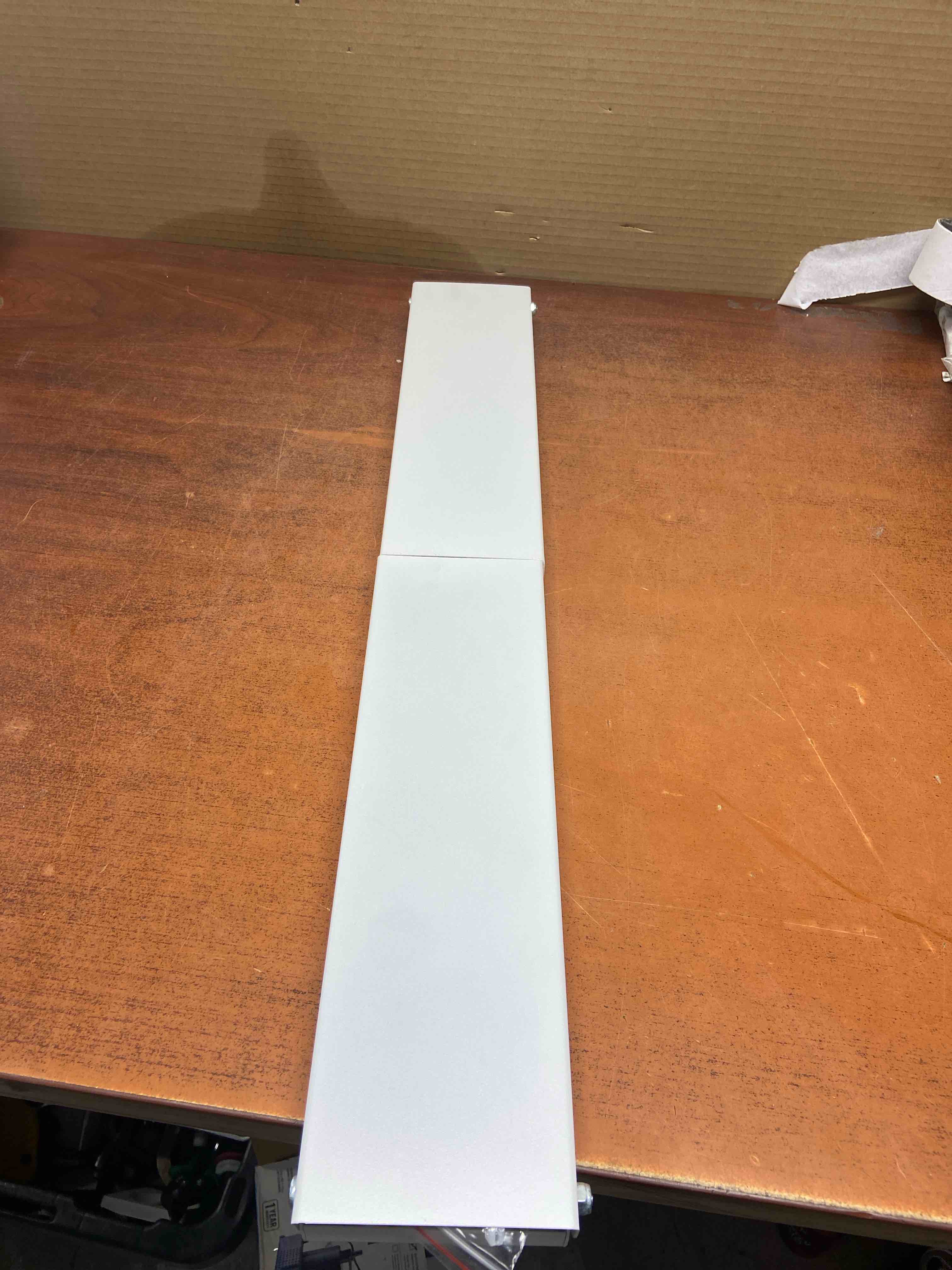 Condition photo showing New/Like New for folding wall towel drying rack