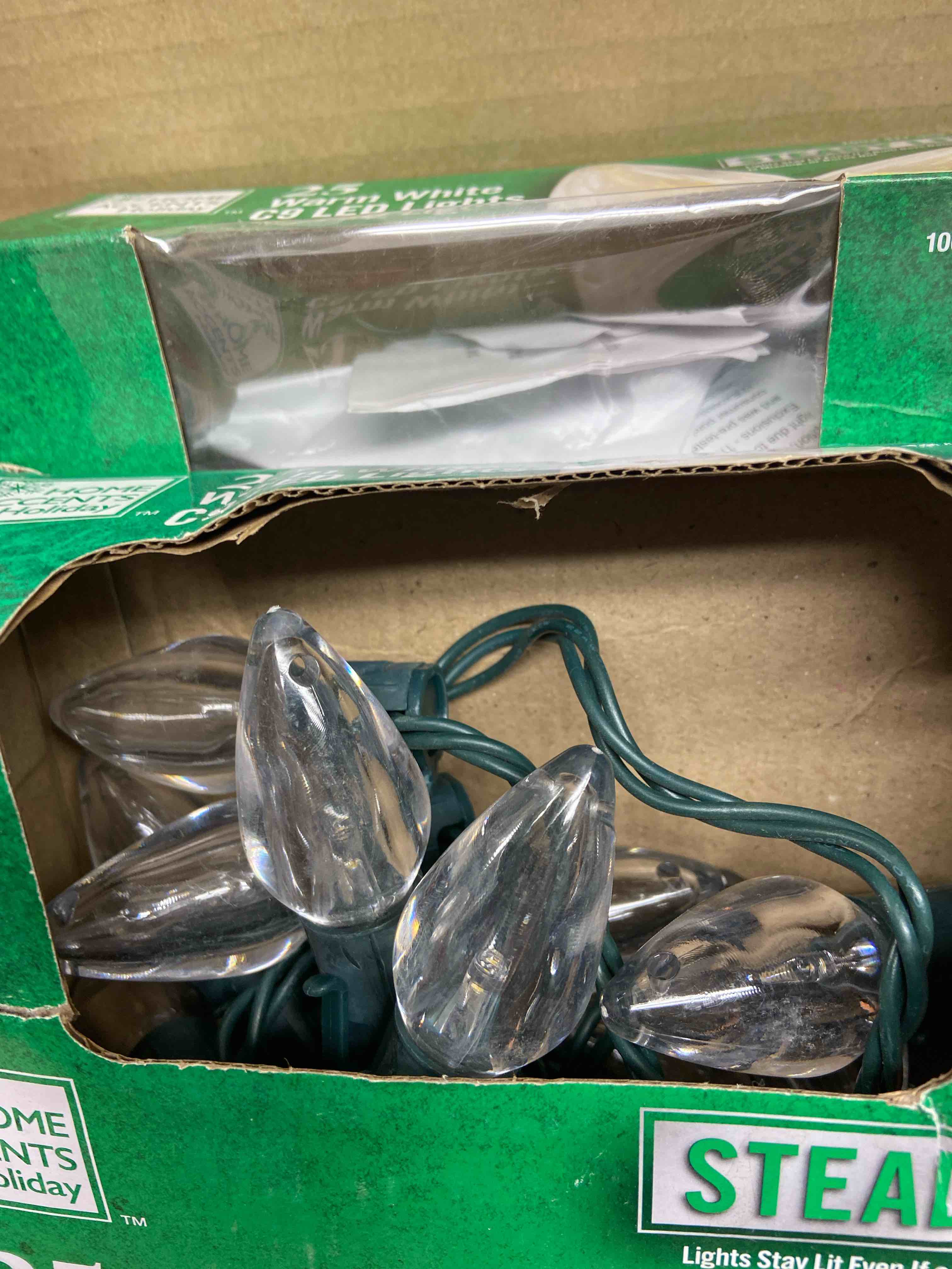 Condition photo showing New/Like New for 25-light led smooth c9 warm white string light 25 ft. super bright