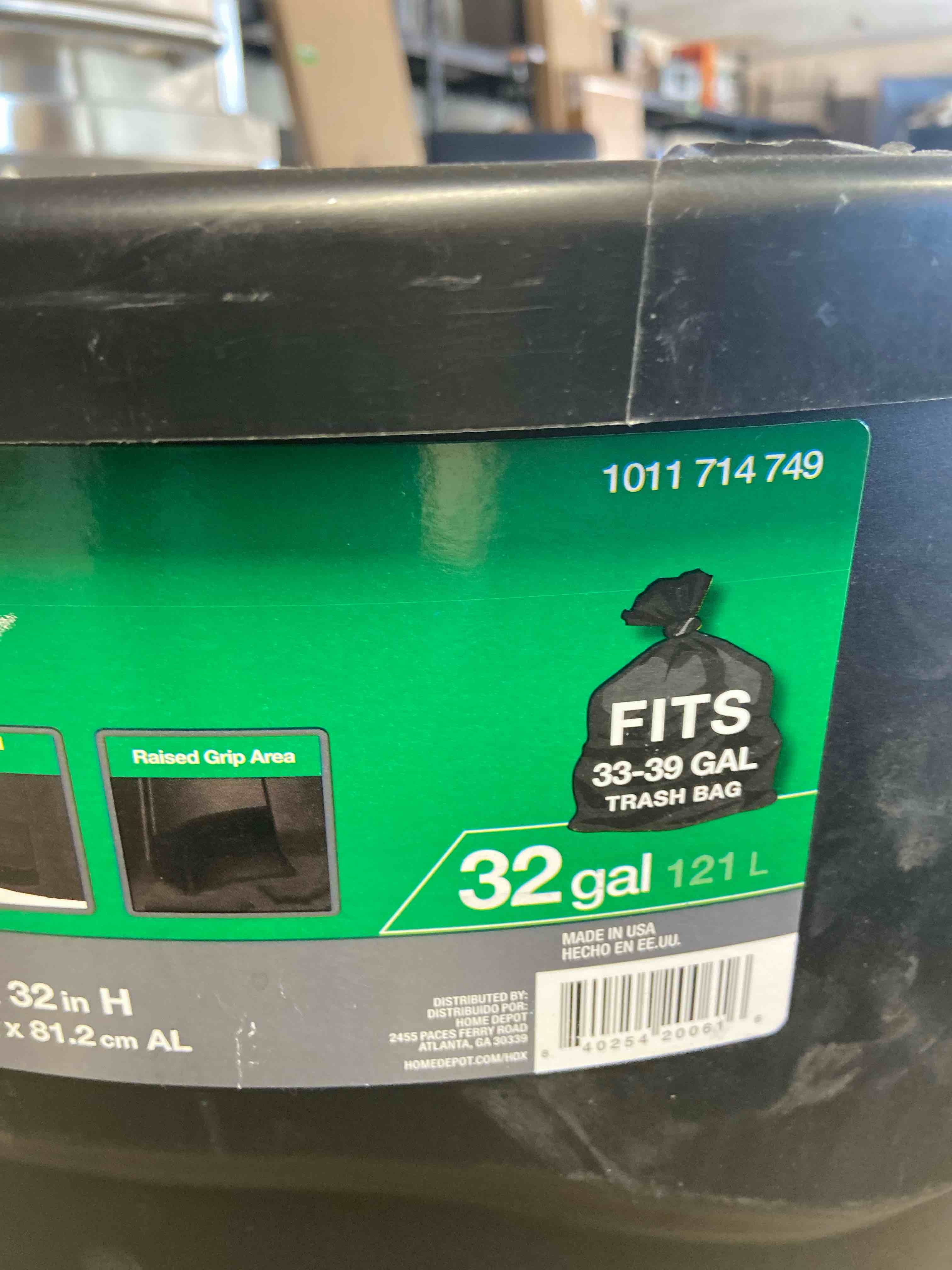 Condition photo showing New/Like New for 32 gal. black outdoor vented trash can with domed lid** missing lid**