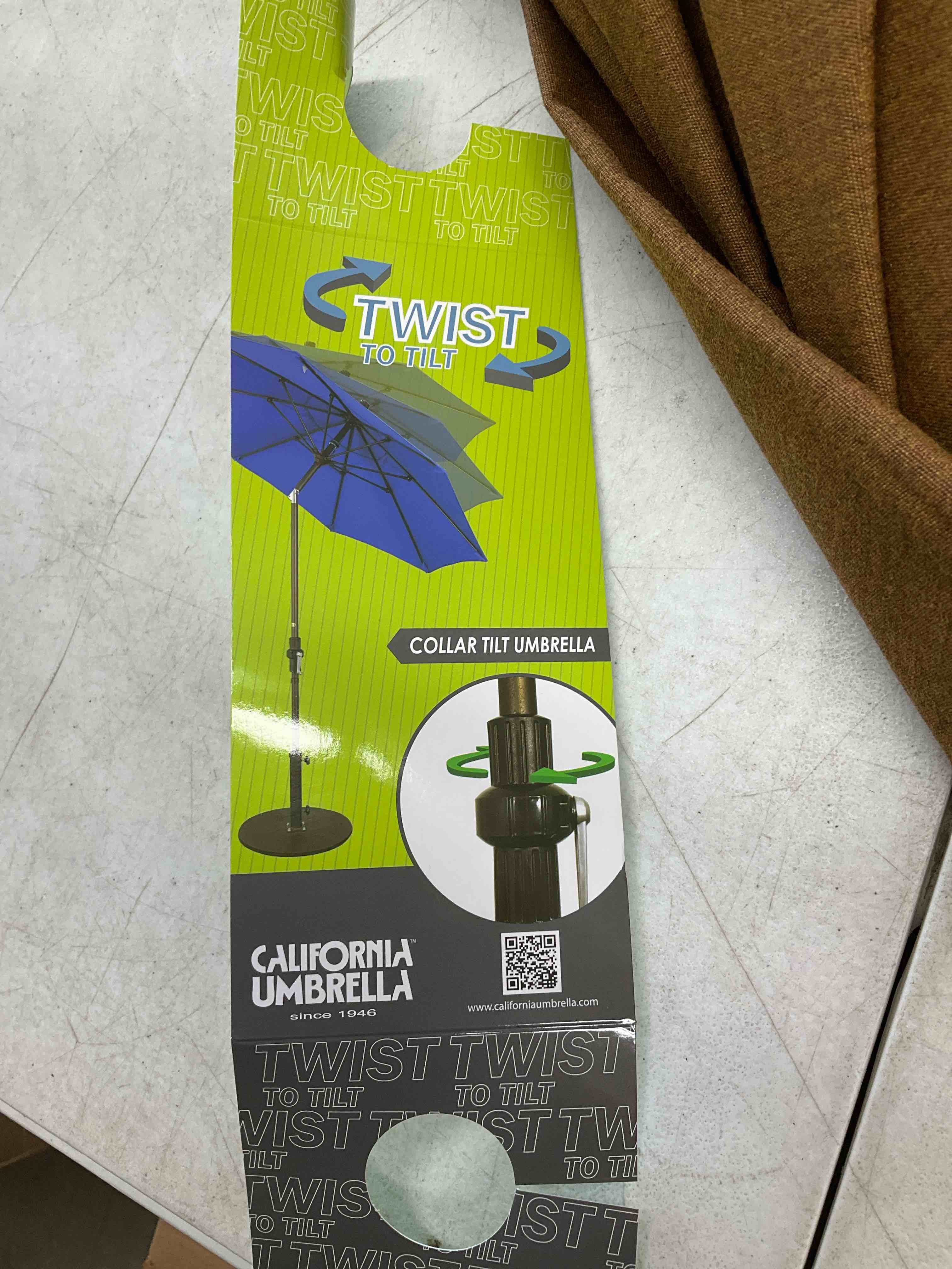 Condition photo showing New/Like New for california umbrella 9 foot bronze with twist tilt