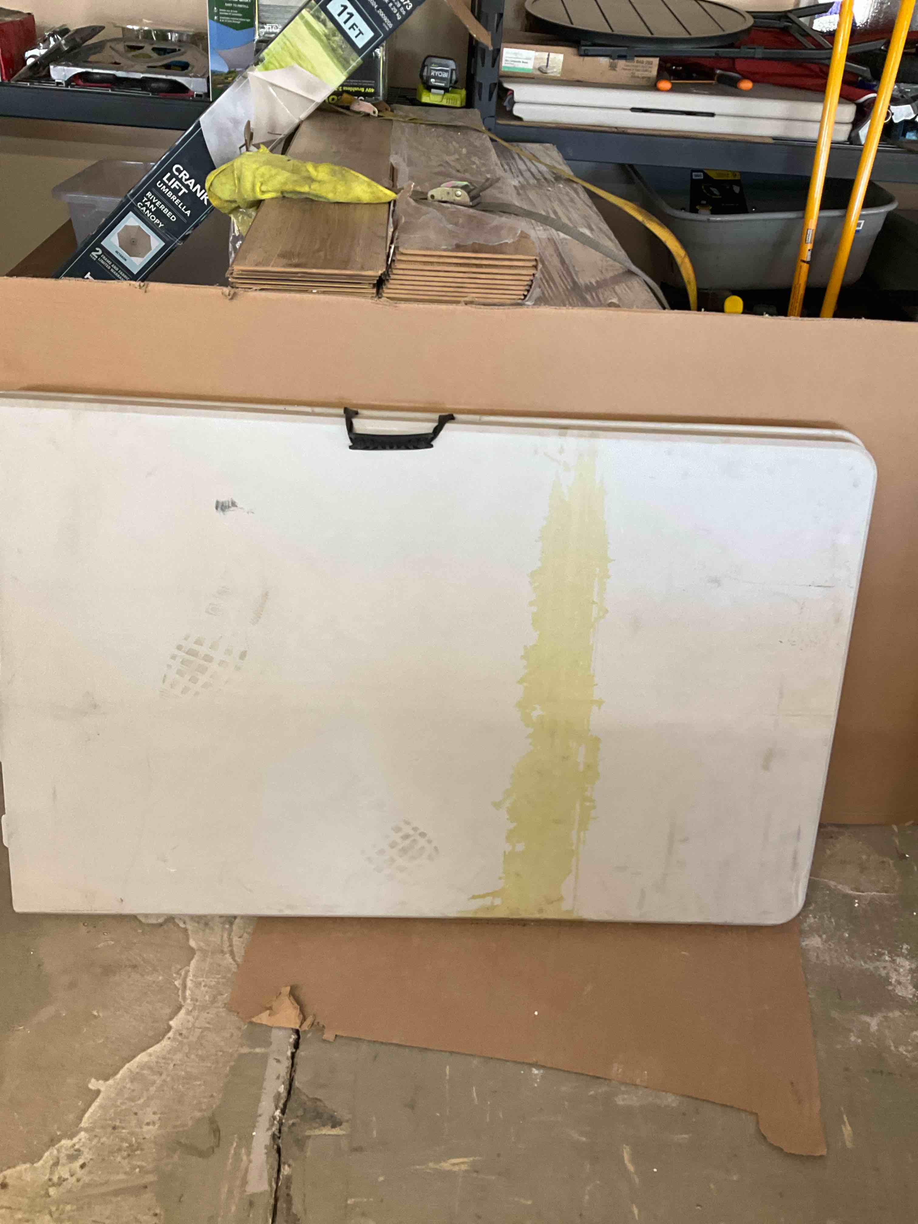 HDX 8ft Earth Tan Folding Table *** Table has stains please see pictures **