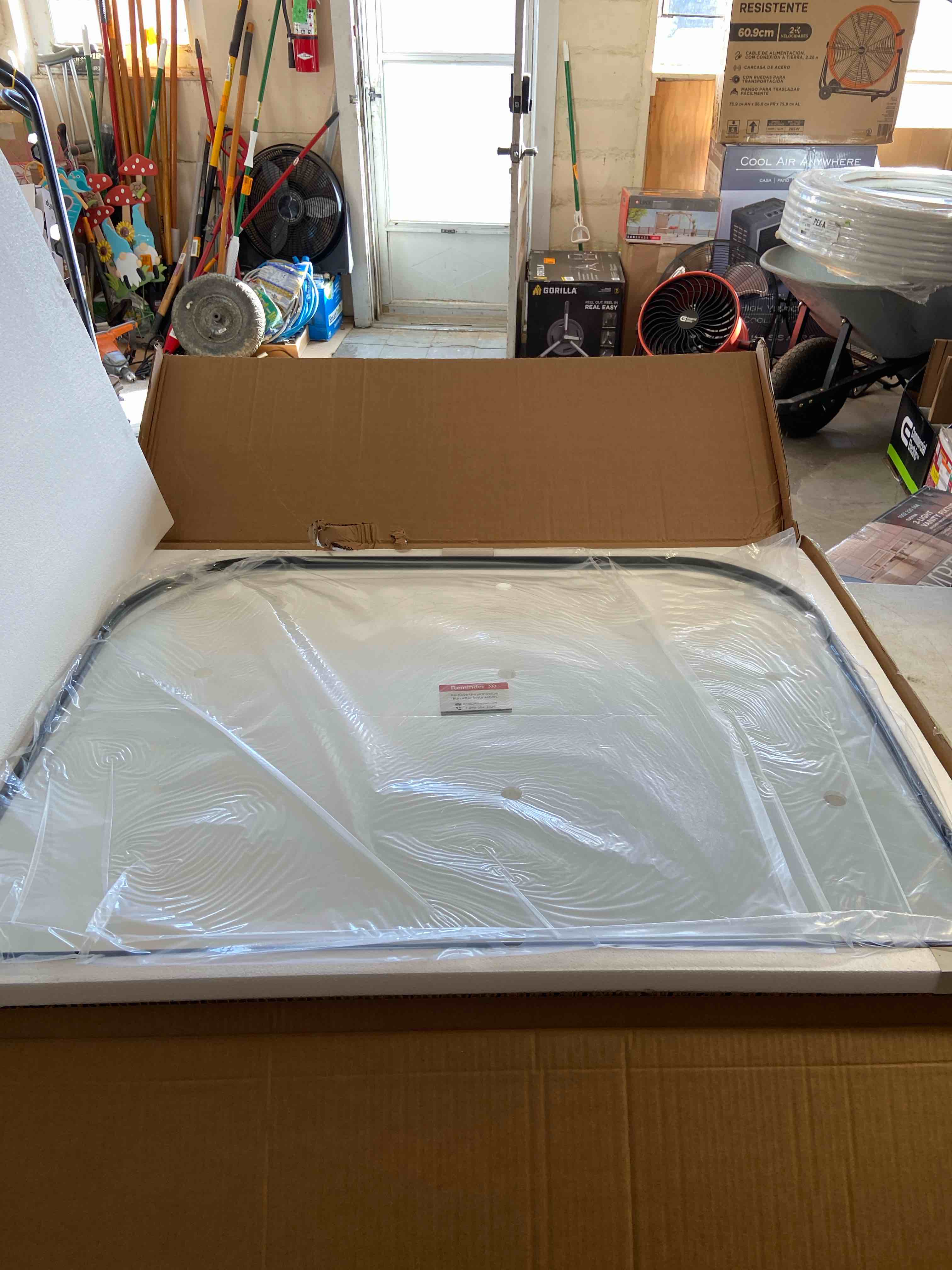 metal framed mirror 40”x30” with curved corners 