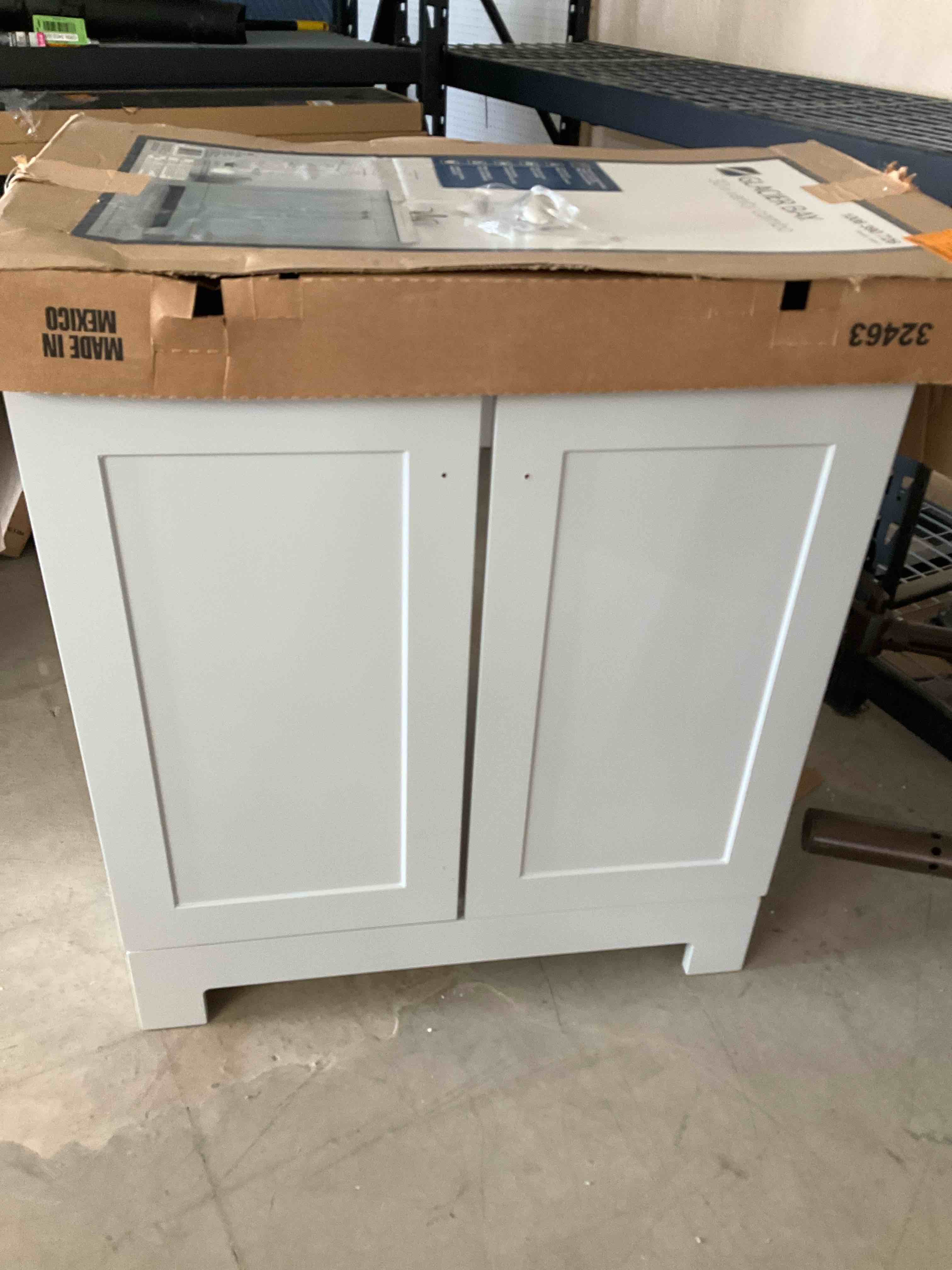 Glacier bay 30” vanity combo pearl gray** bottom corner has cracked board please see pictures **