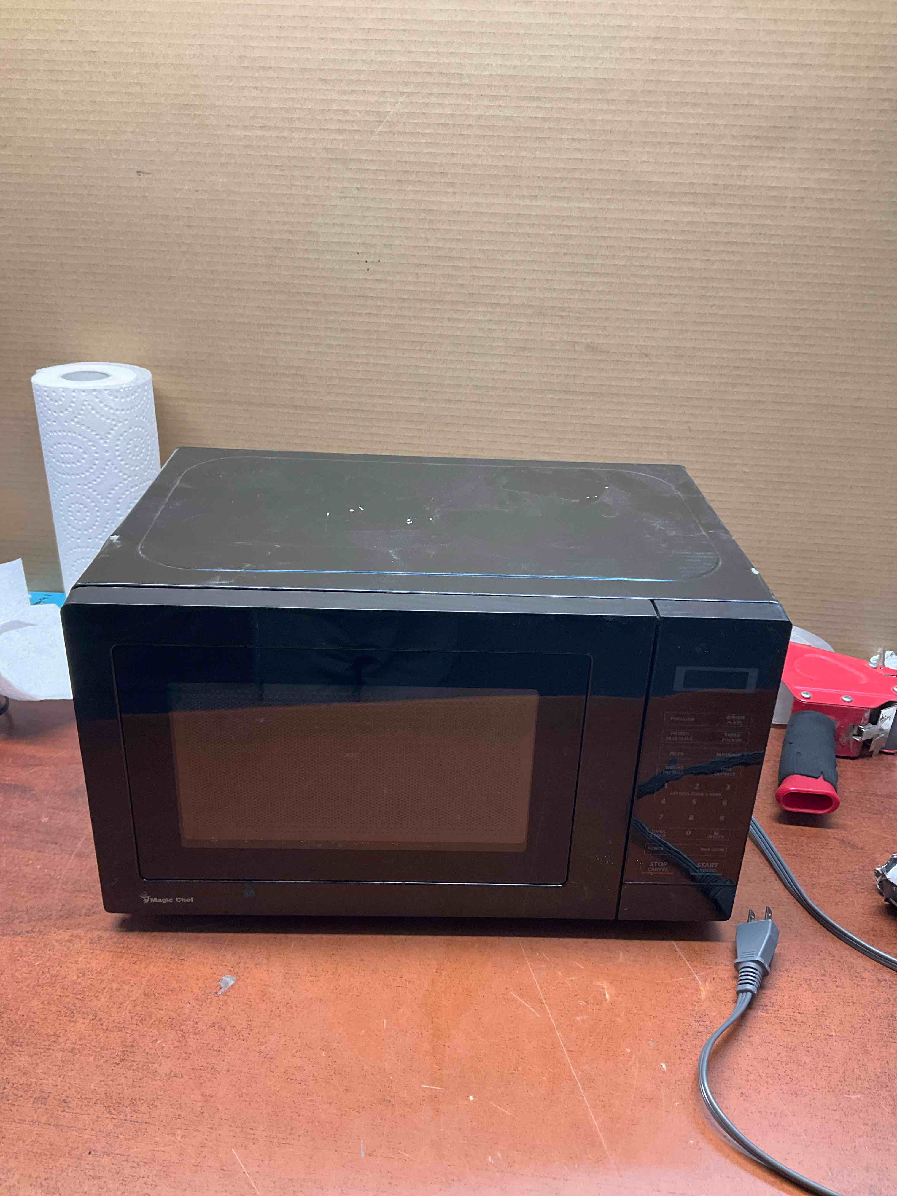 Magic Chef microwave small** small dent on side please see pictures 