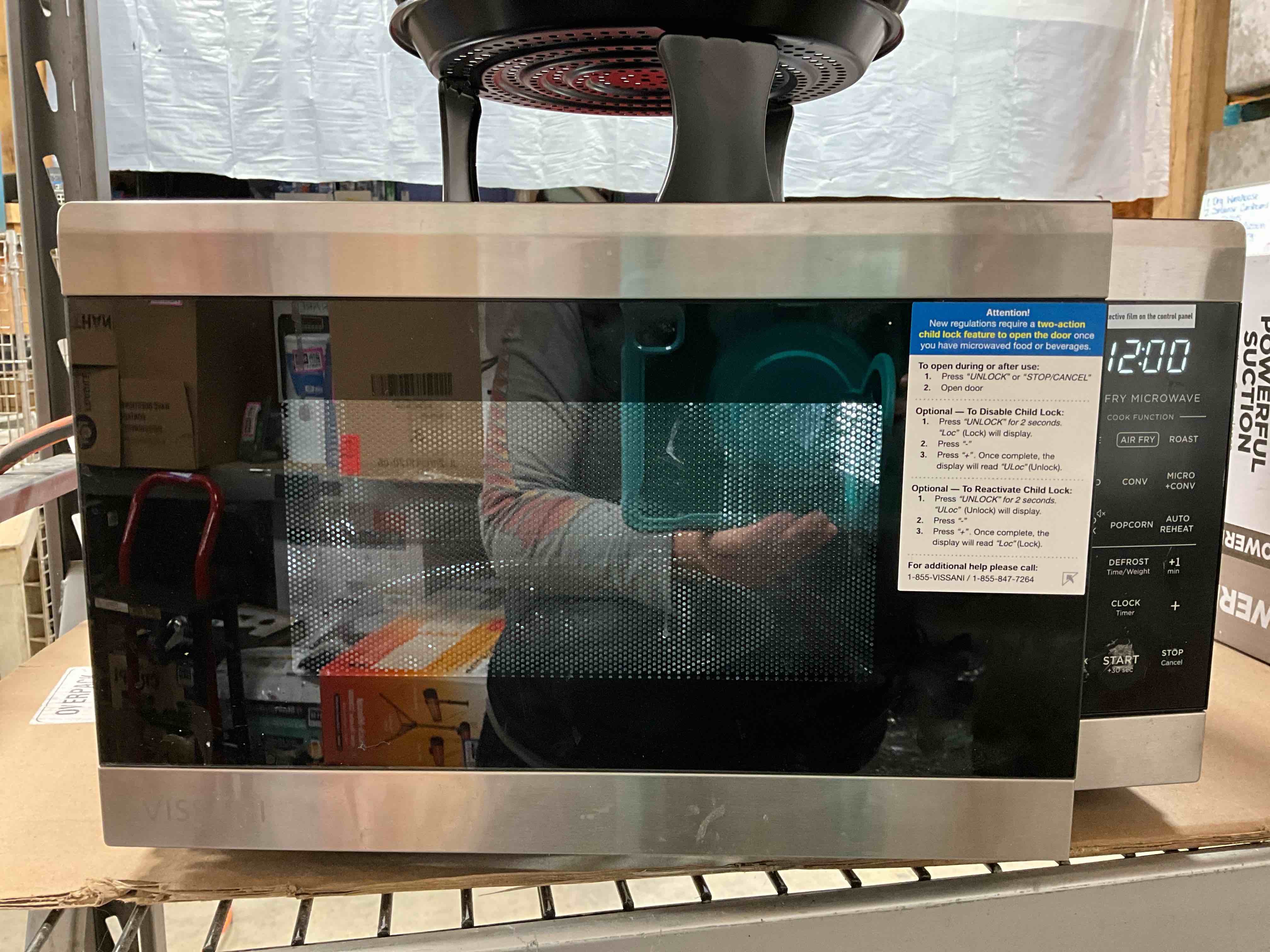 Condition photo showing Good Condition for Working Condition Verified. Previously Owned. 19 in. 0.9 cu. ft. 900-Watt Countertop Microwave Oven in Stainless Steel with Convection and Air Fry