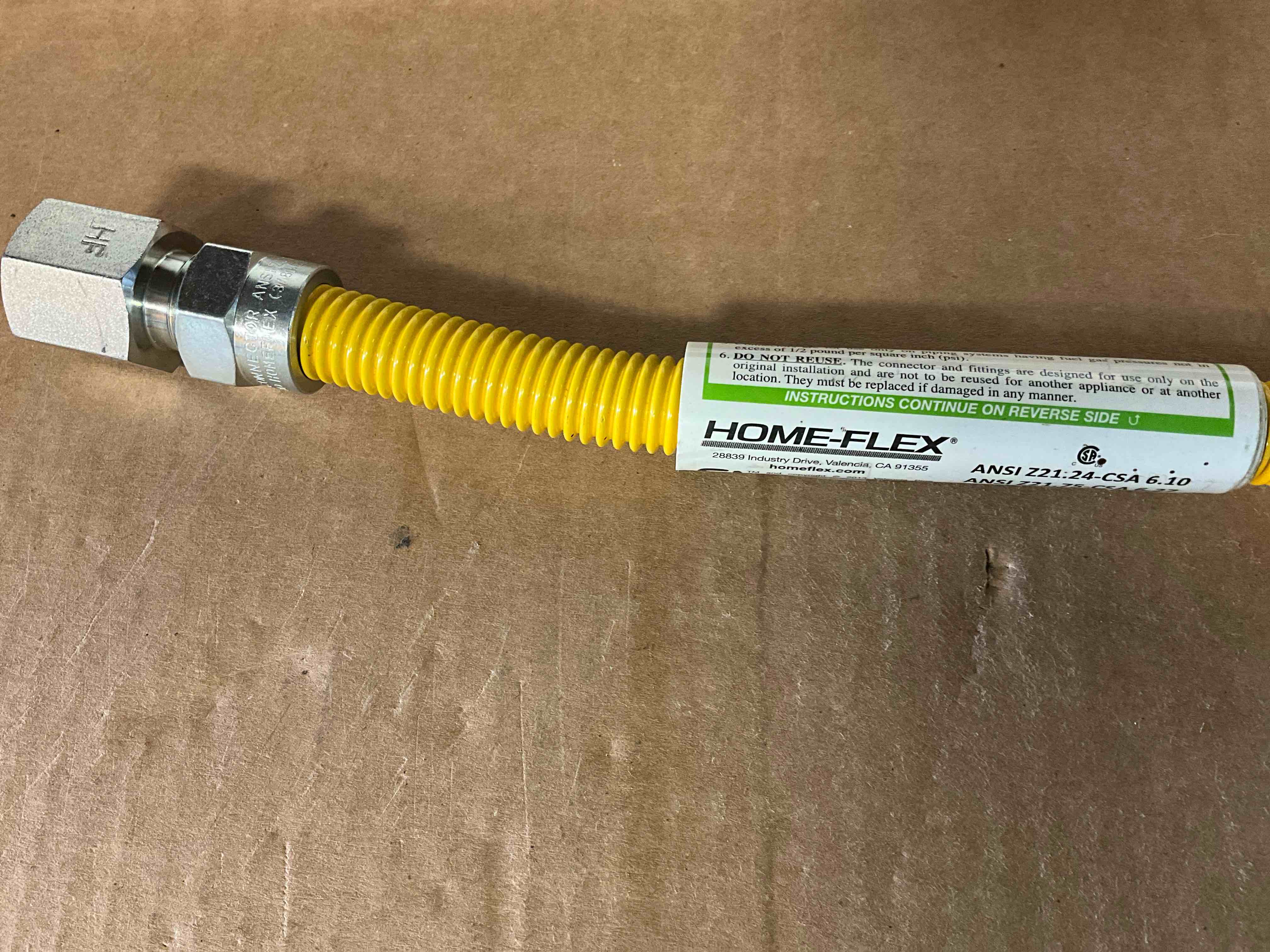 Condition photo showing New/Like New for 24 in. Flexible 1/2 in. O.D. x 3/8 in. Fittings Gas Connector Yellow Coated Stainless Steel for Dryer and Water Heater