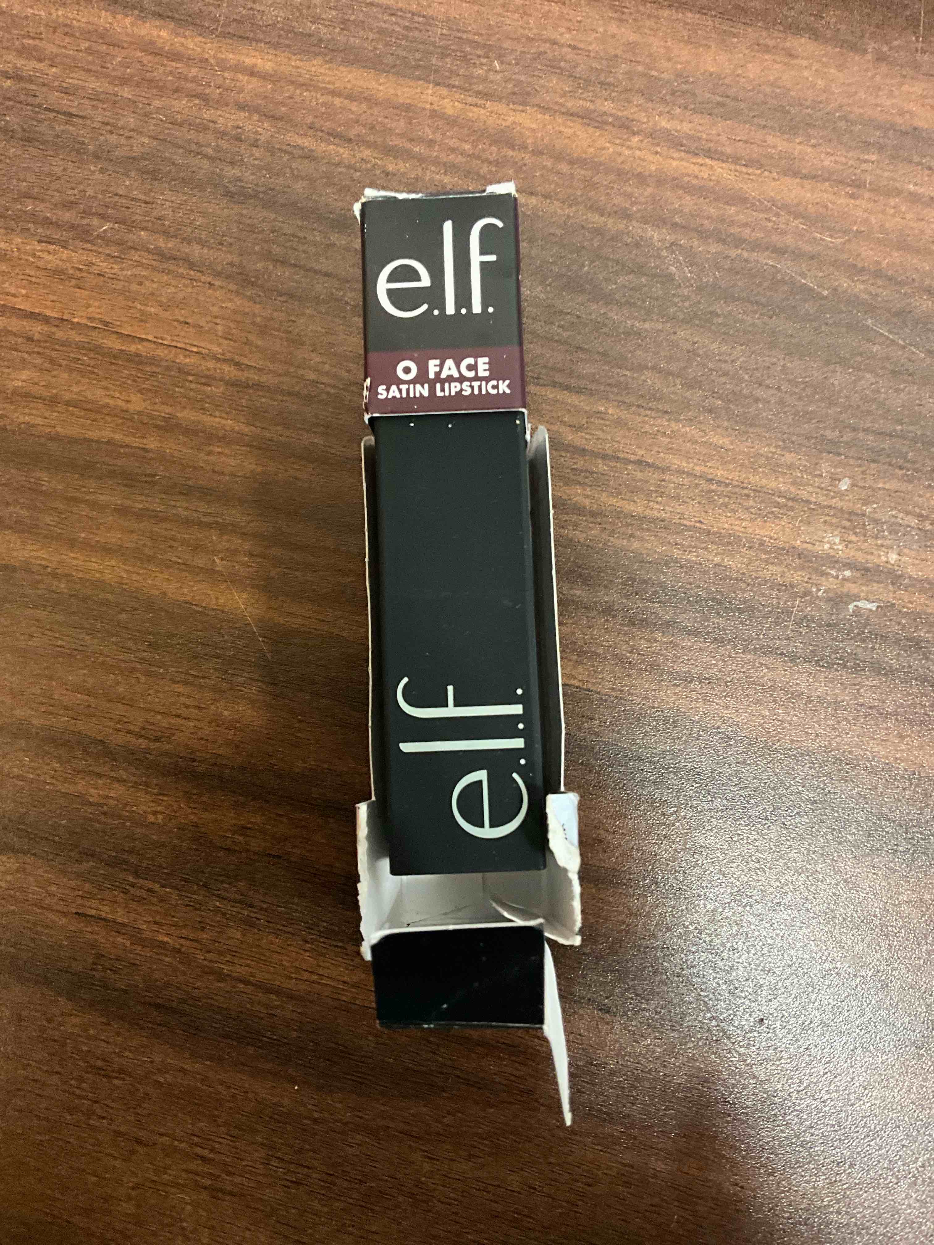 Condition photo showing New/Like New for e.l.f. o face satin lipstick, richly pigmented, nourishing & long-lasting creamy lipstick, infused with jojoba, vegan & cruelty-free, smolder