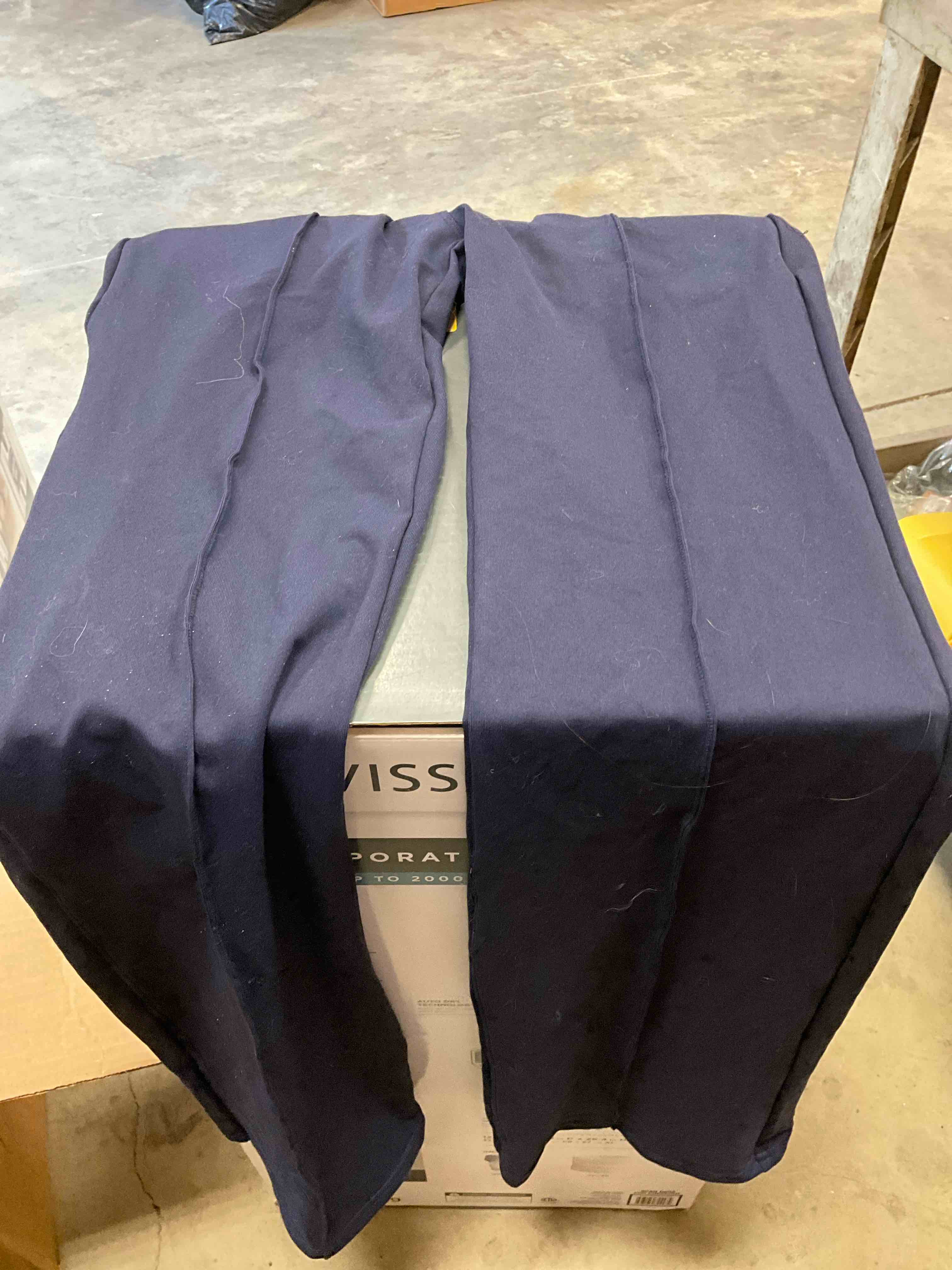 Condition photo showing Good Condition for medium. iuga navy blue flare leg strapless jumpsuit with pockets